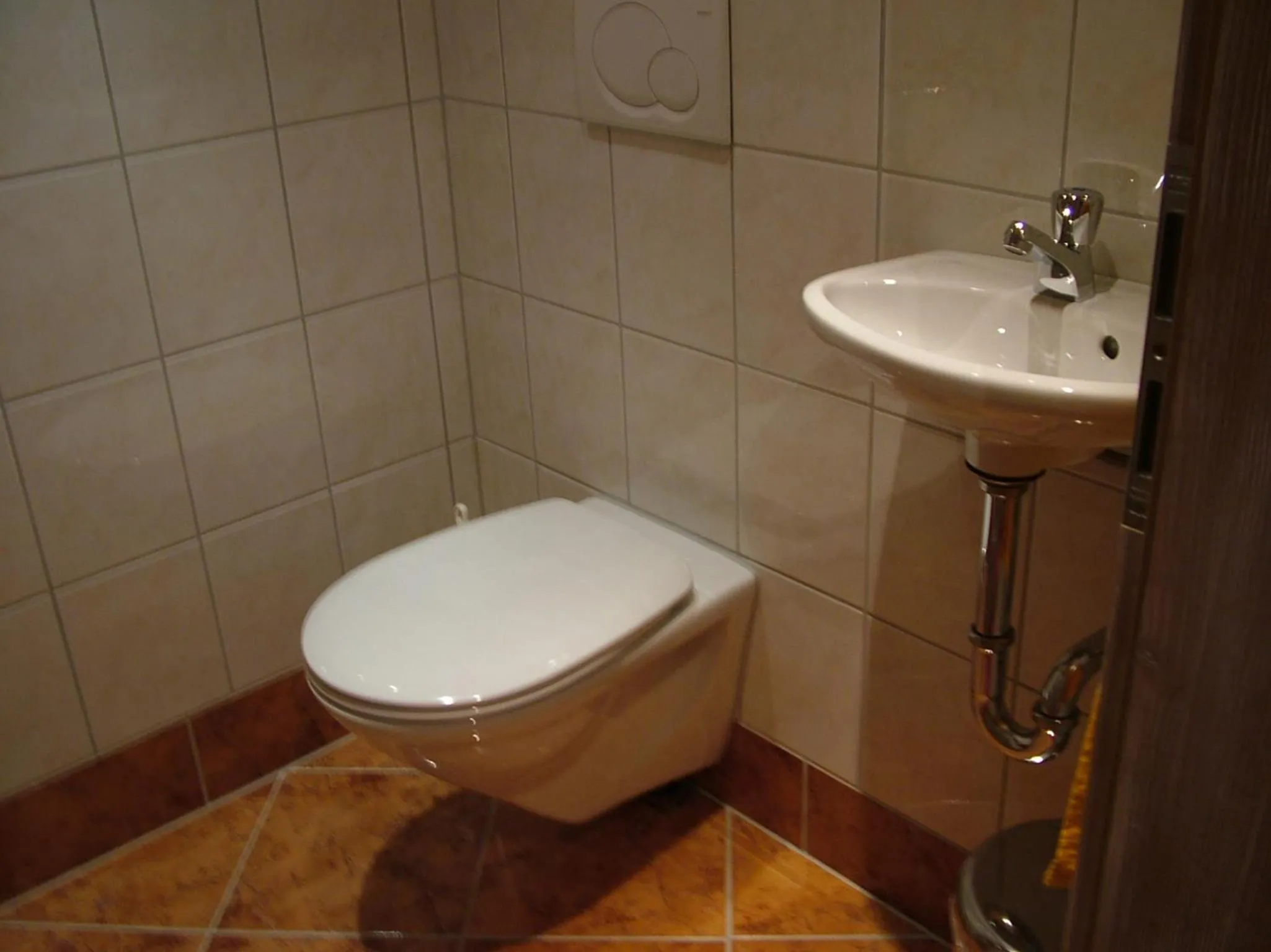 Toilet in Appartements Gästehaus Schrott