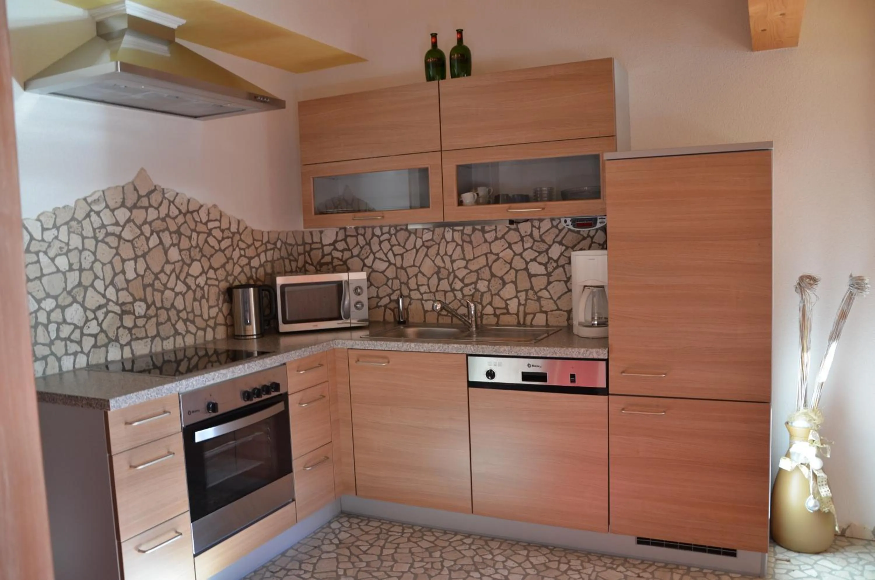 Kitchen or kitchenette in Appartements Gästehaus Schrott