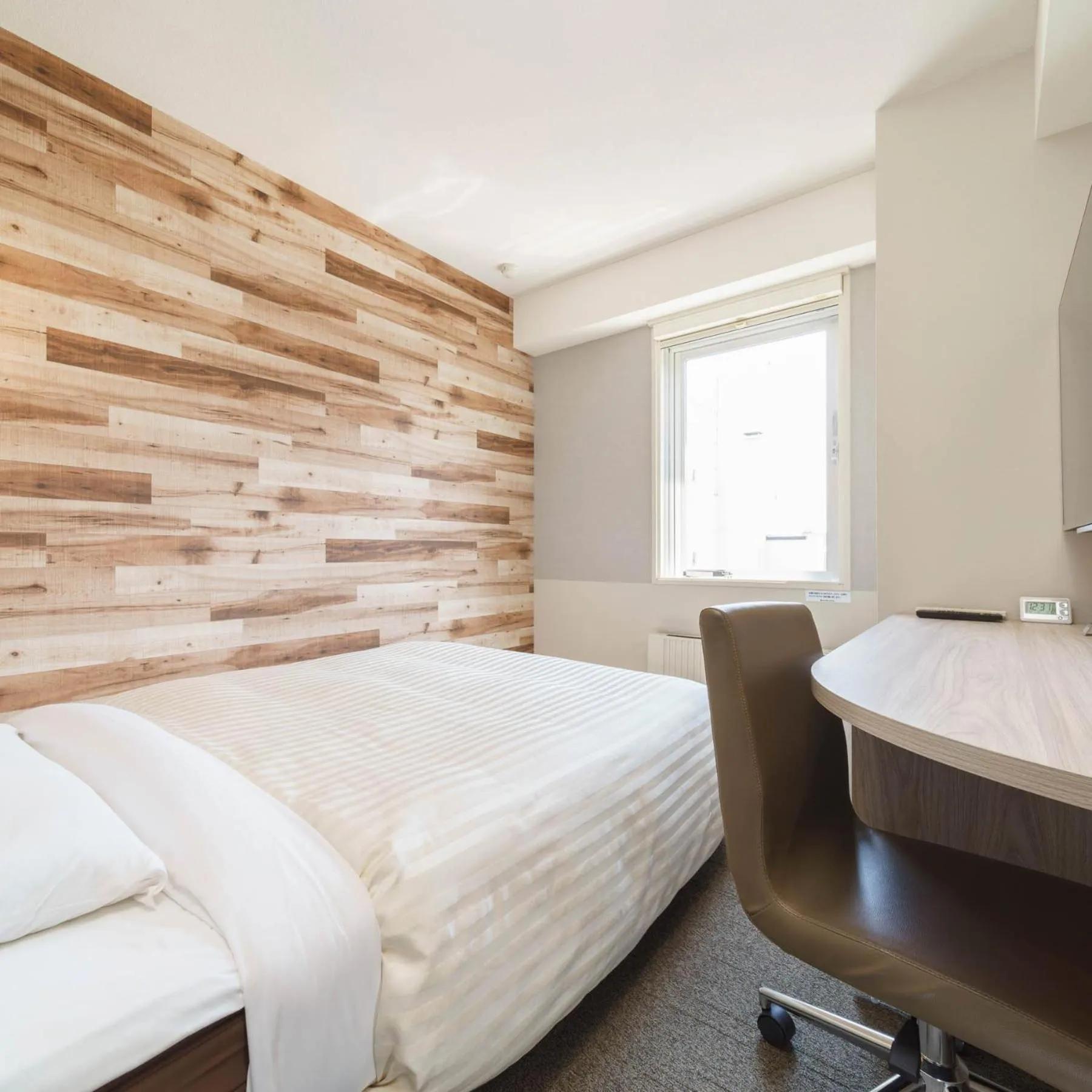 Bed in Super Hotel Kushiro Kurogane