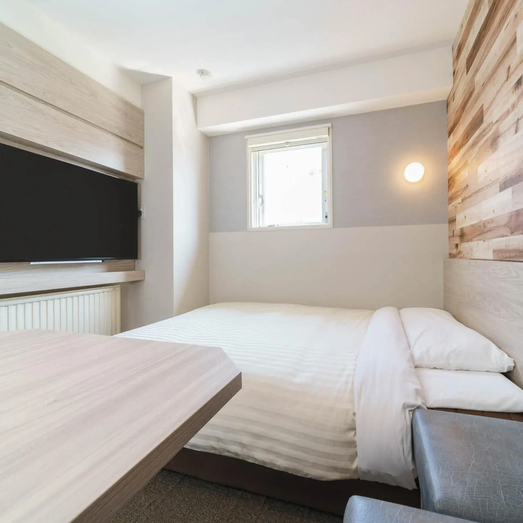 Bed in Super Hotel Kushiro Kurogane Bed in Super Hotel Kushiro Kurogane