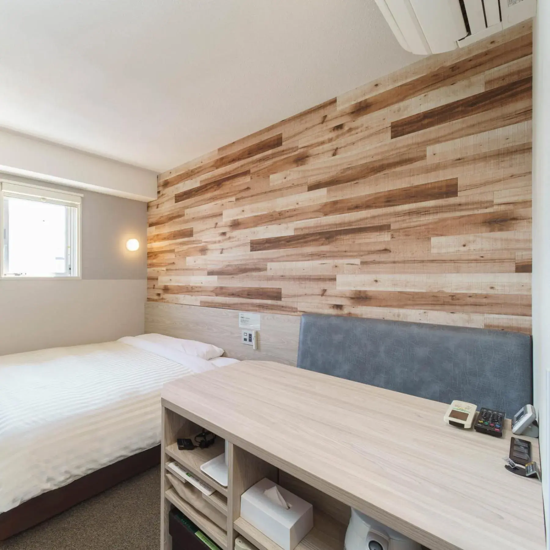 Bed in Super Hotel Kushiro Kurogane Bed in Super Hotel Kushiro Kurogane