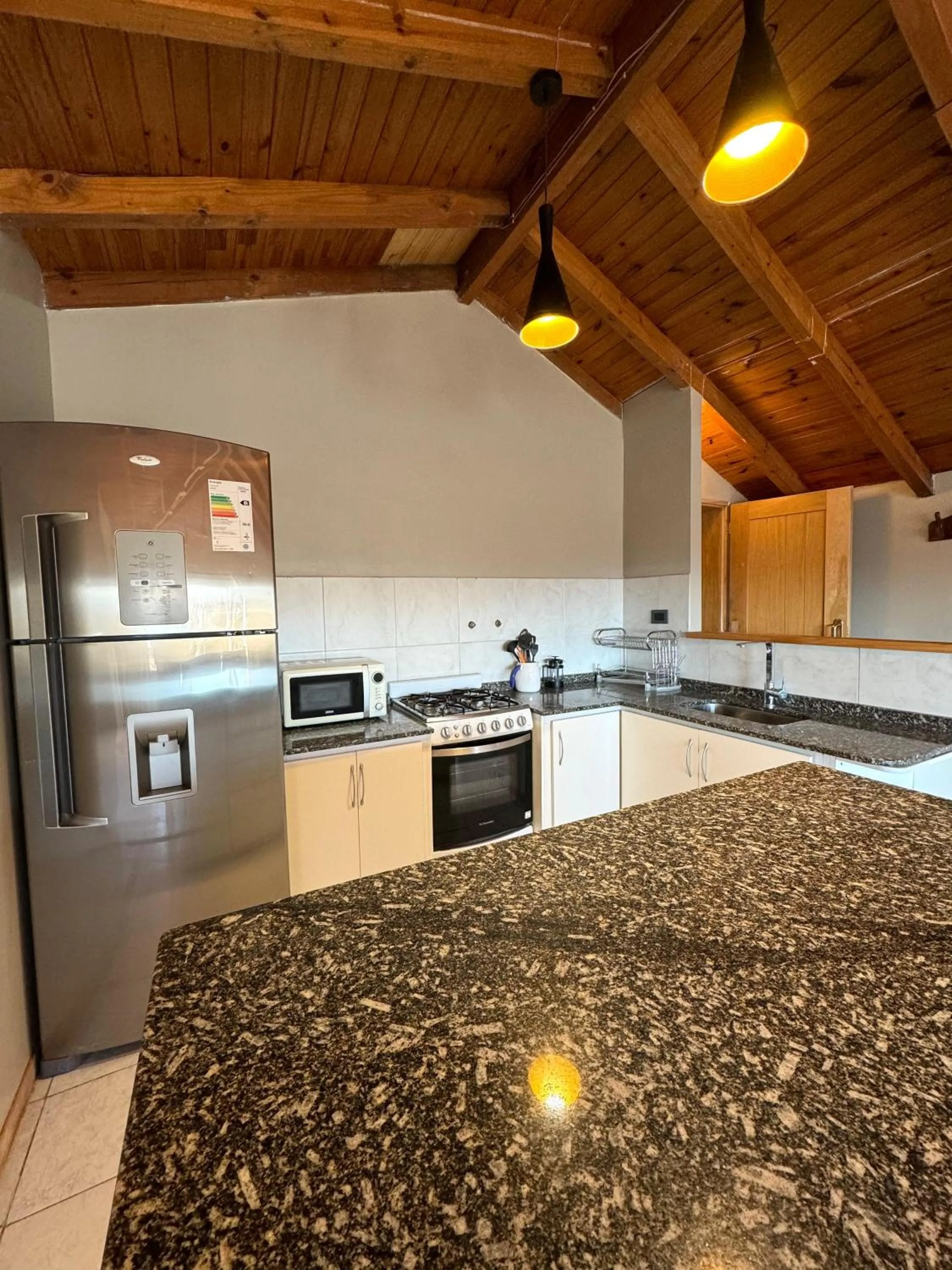 Kitchen or kitchenette in Antu Mahuida Apartments