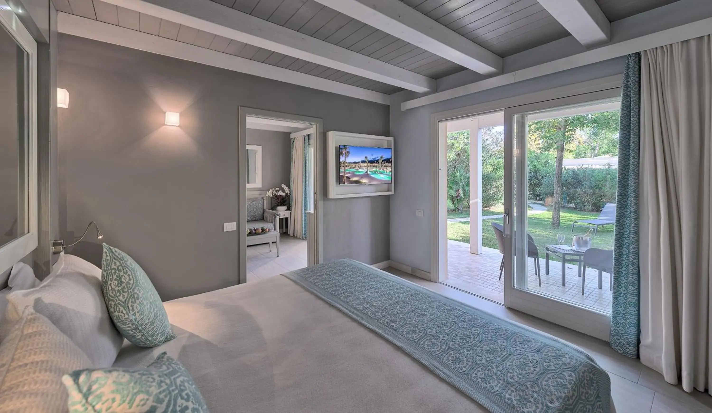 Living room, Bed in Forte Village Resort - Le Palme Living room, Bed in Forte Village Resort - Le Palme