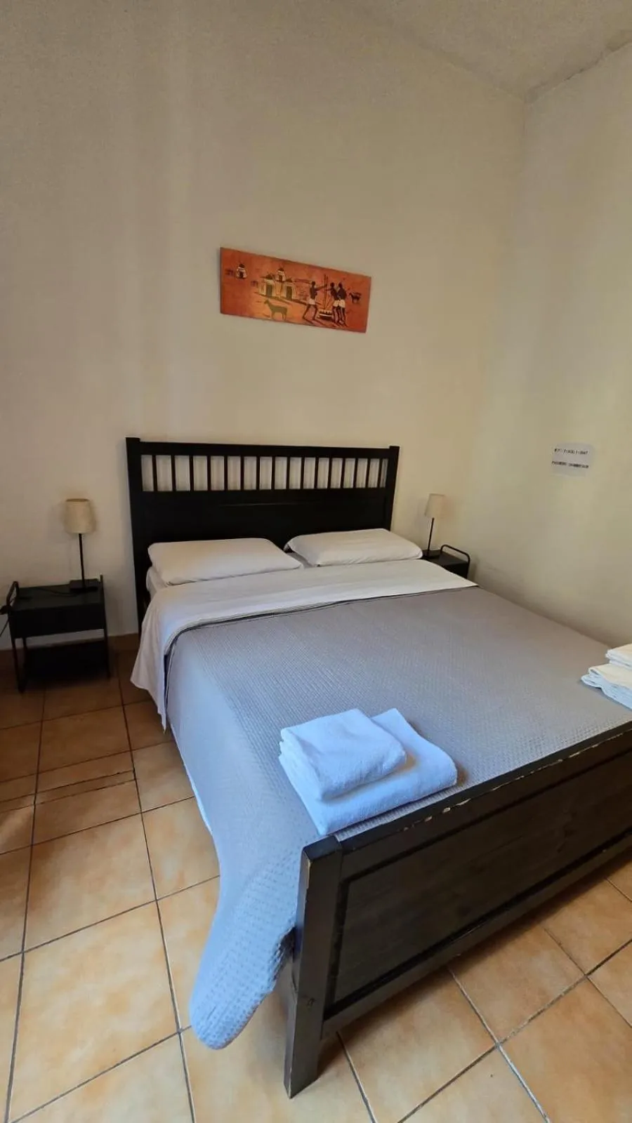 Bed in Meltin' Rome Guest House