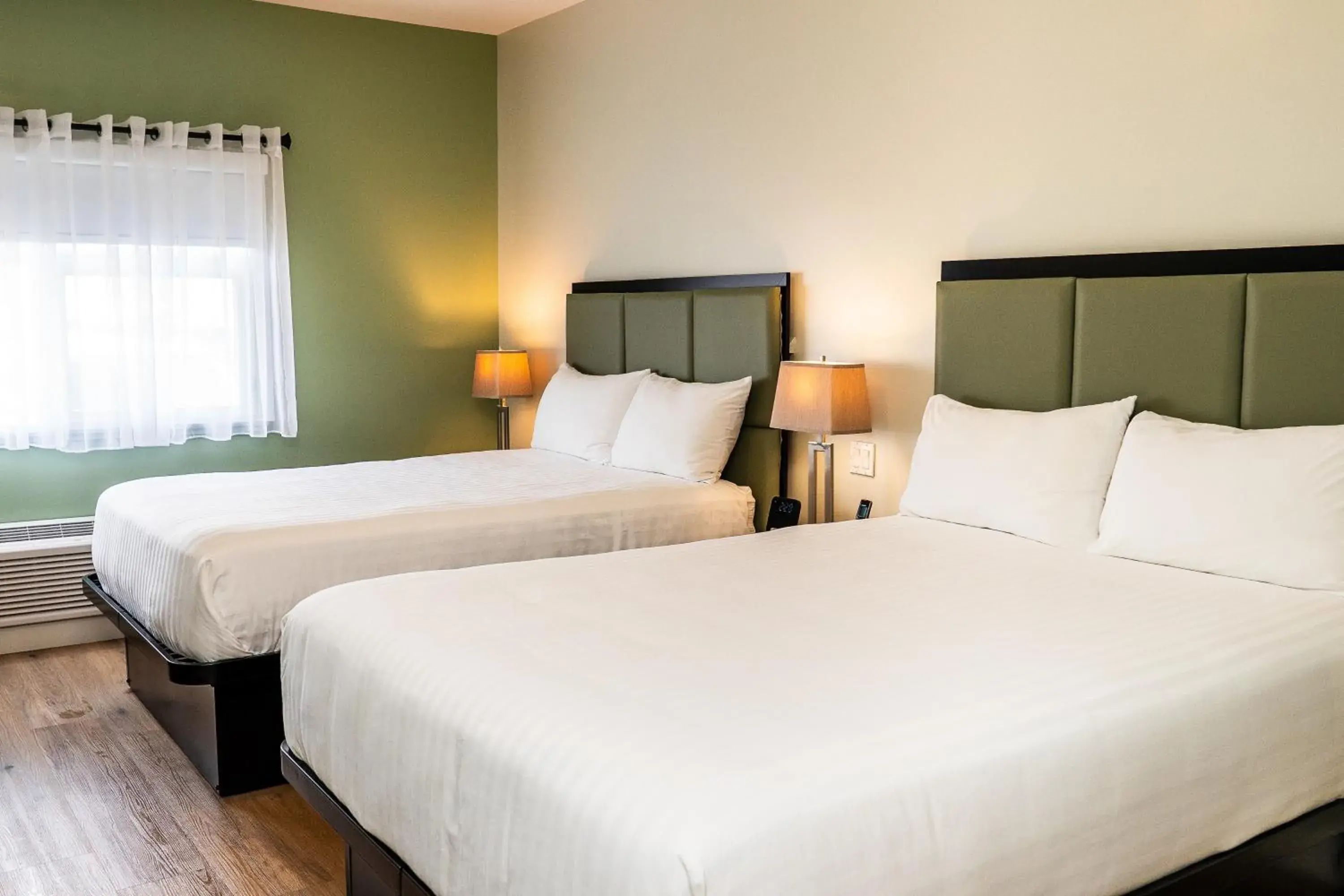 Queen Room with Two Queen Beds in SKKY Hotel Queen Room with Two Queen Beds in SKKY Hotel