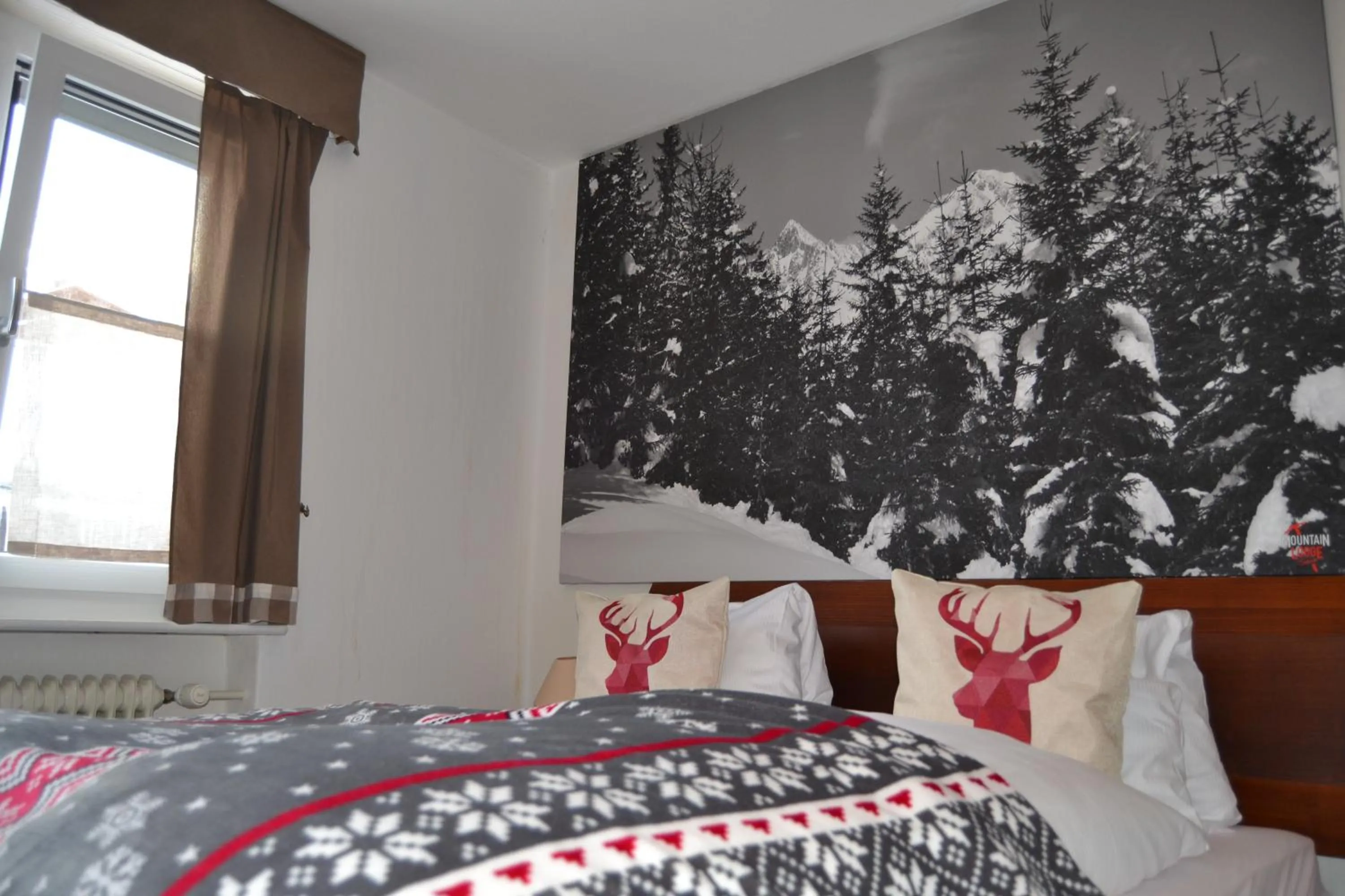 Bed in Mountain Lodge Sedrun