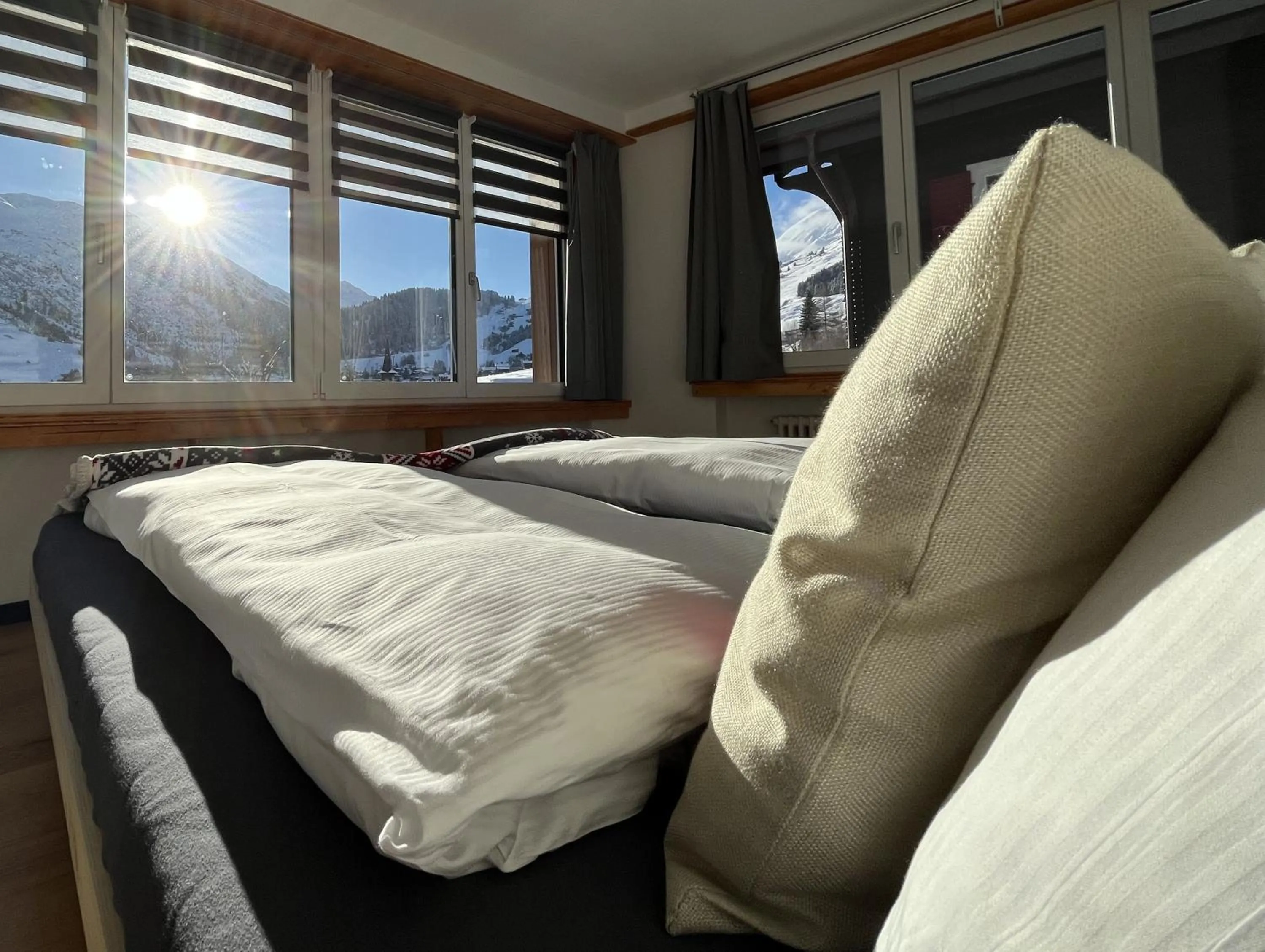 View (from property/room), Bed in Mountain Lodge Sedrun