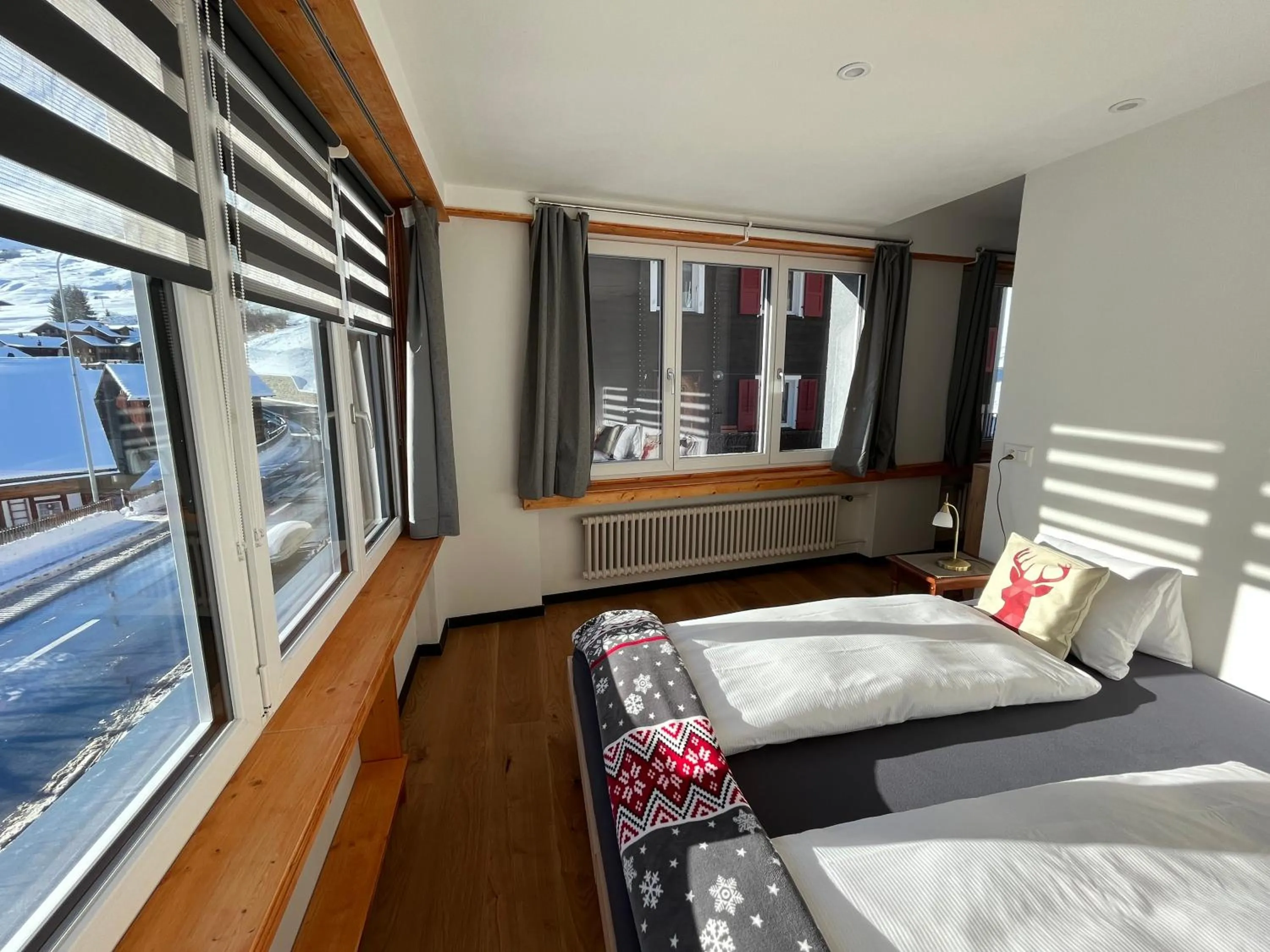 Photo of the whole room, Bed in Mountain Lodge Sedrun