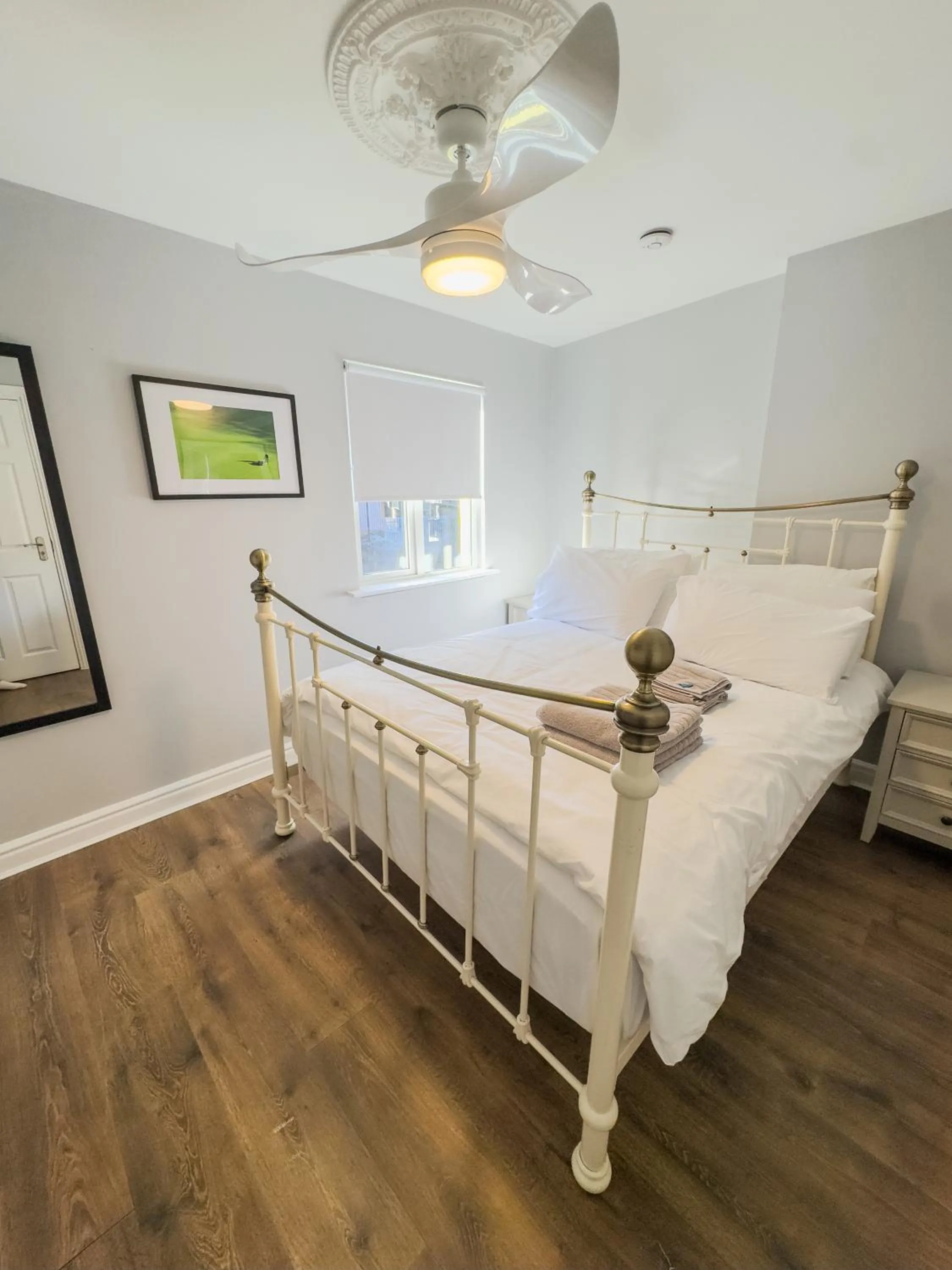 Bed in Molloys Apartments