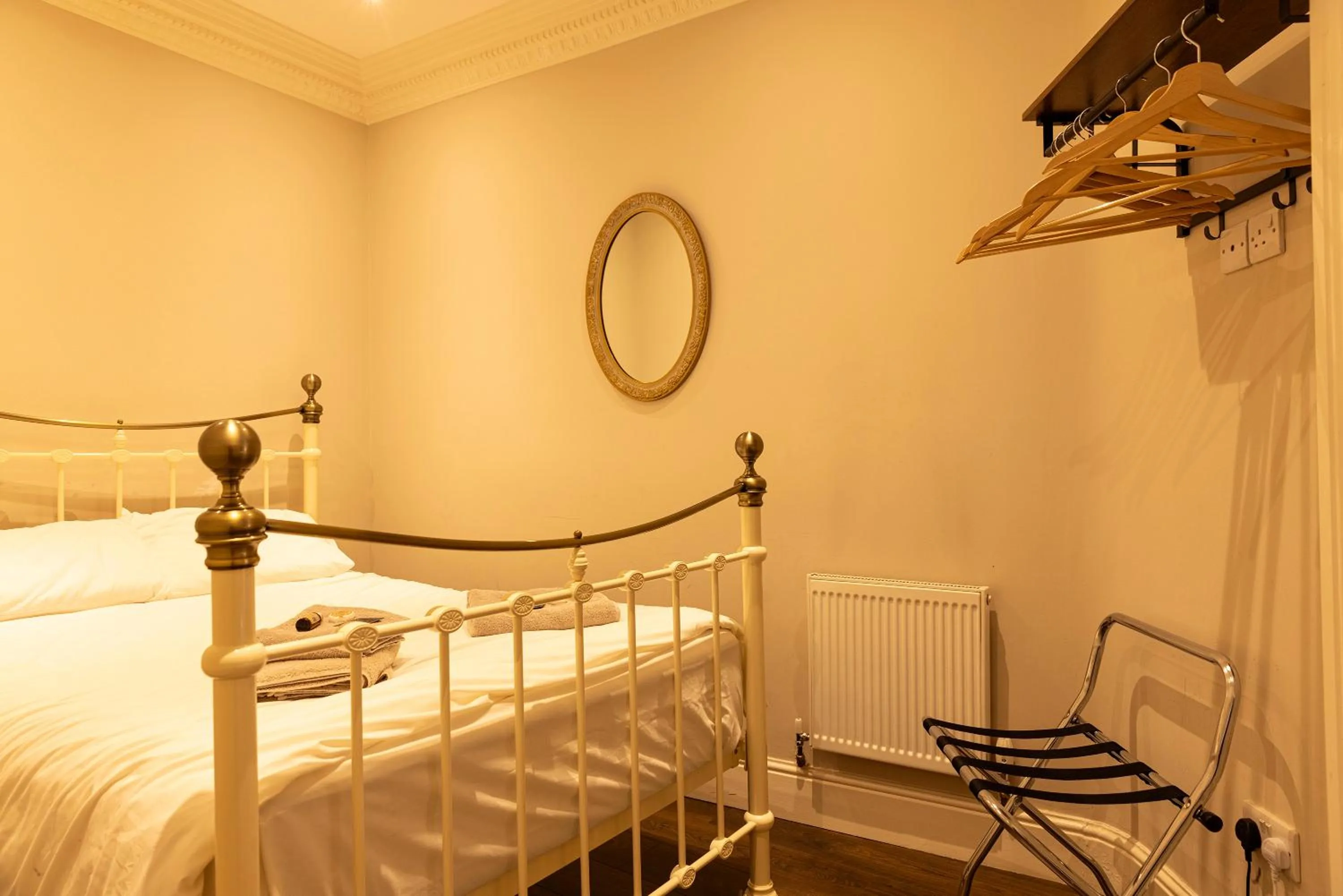 Bed in Molloys Apartments