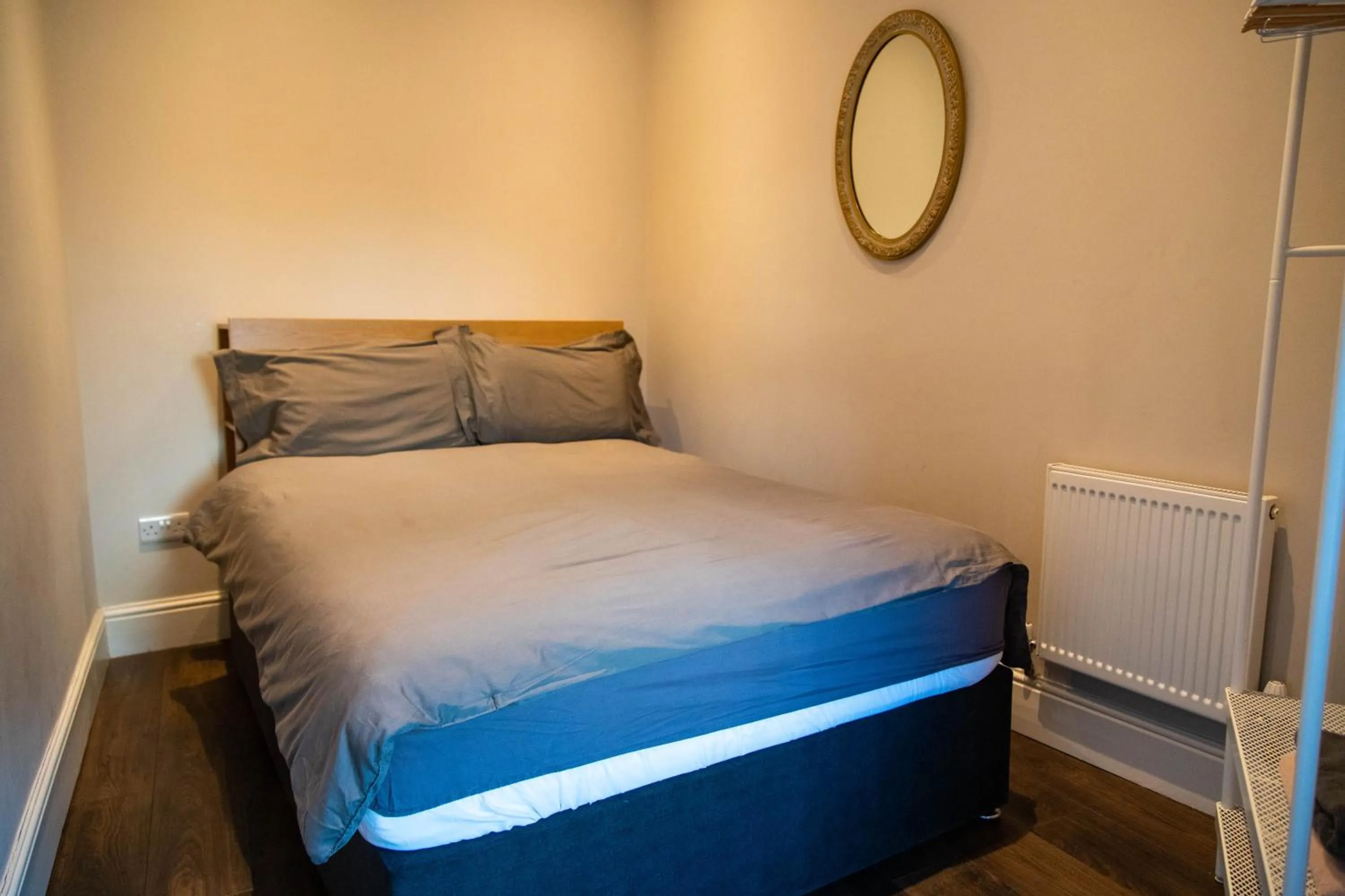 Bed in Molloys Apartments