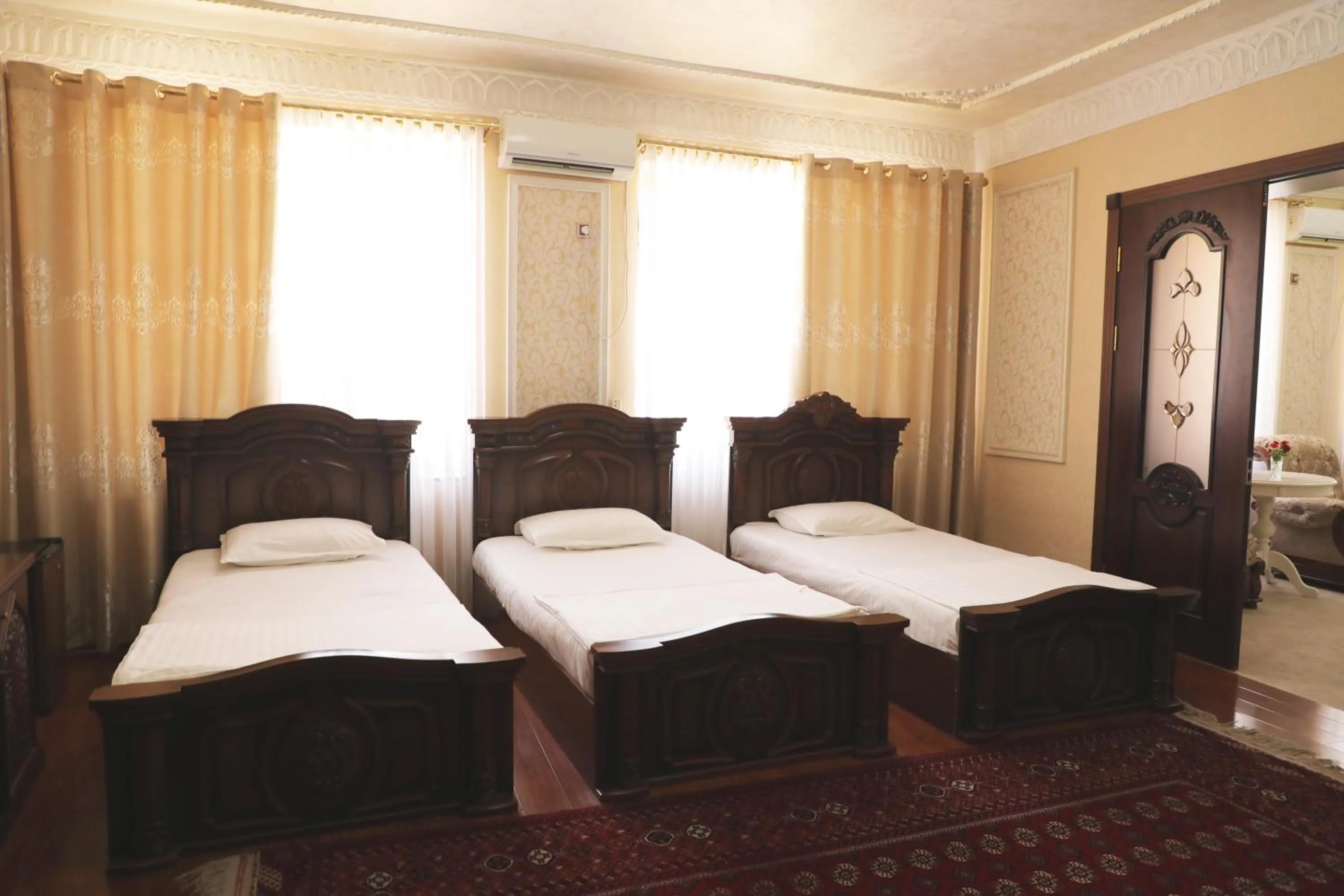 Bed in Hotel KARAVAN