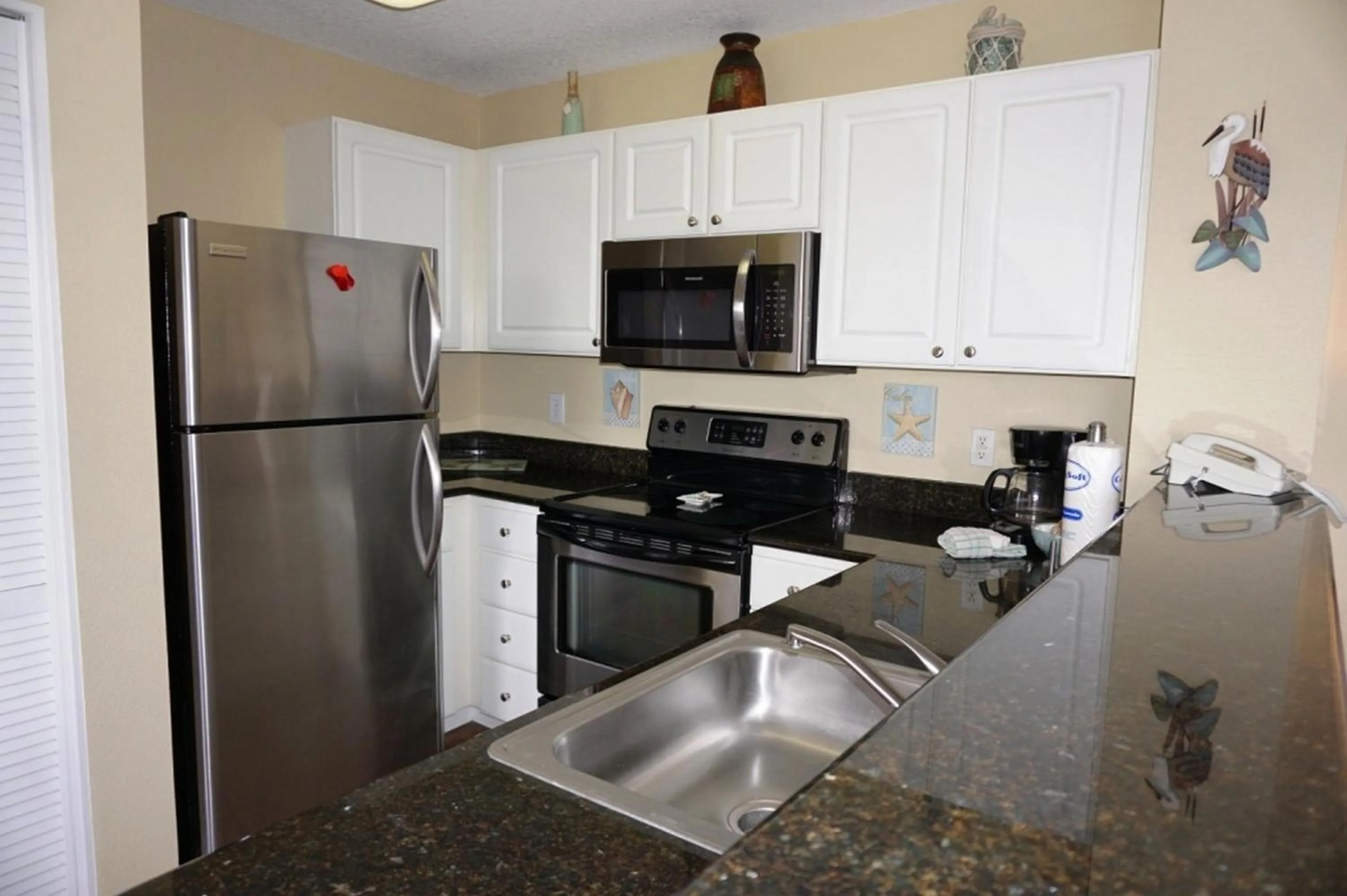 Kitchen or kitchenette in Madeira Bay Resort II by Travel Resort Services