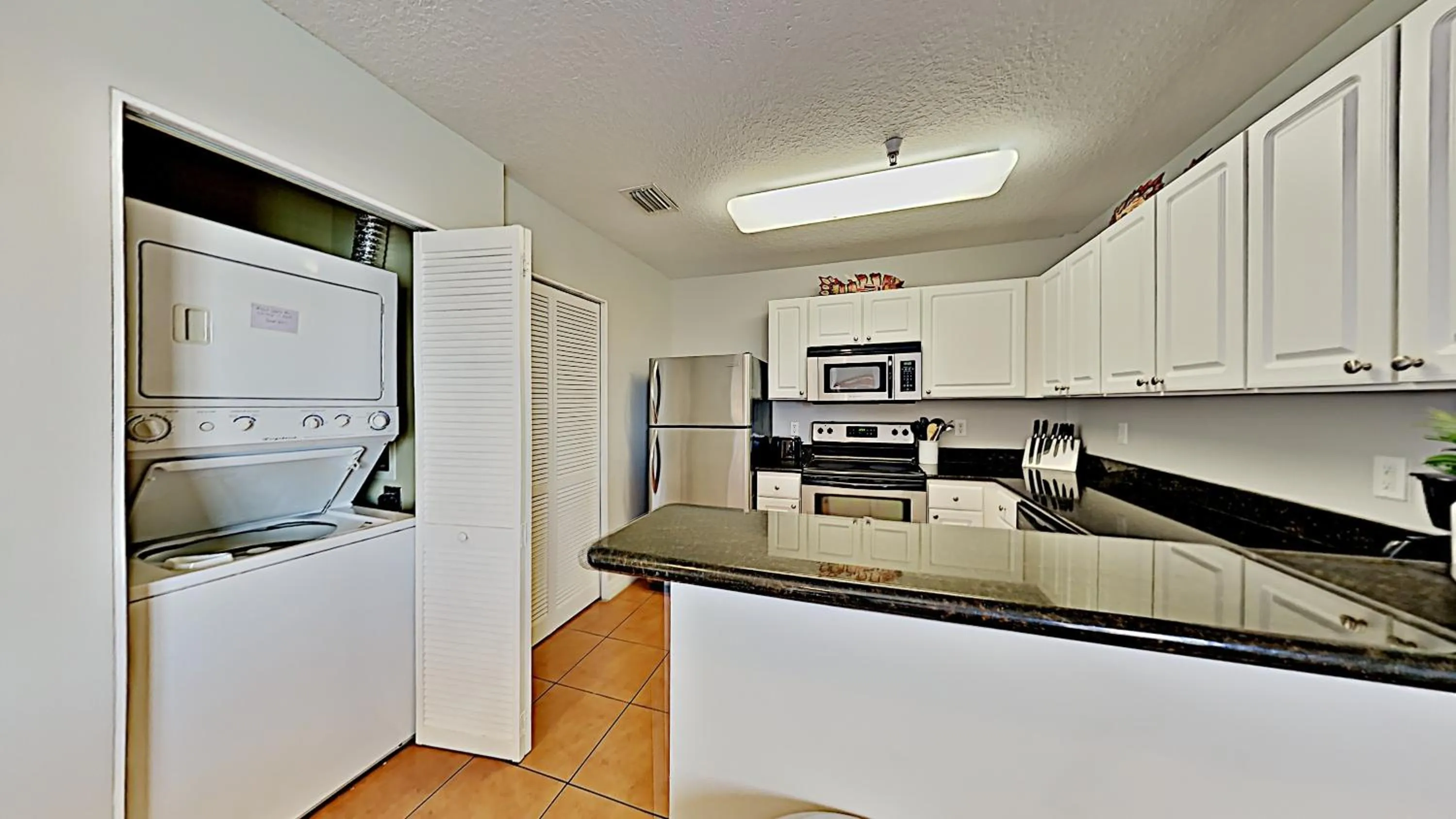 Kitchen or kitchenette in Madeira Bay Resort II by Travel Resort Services