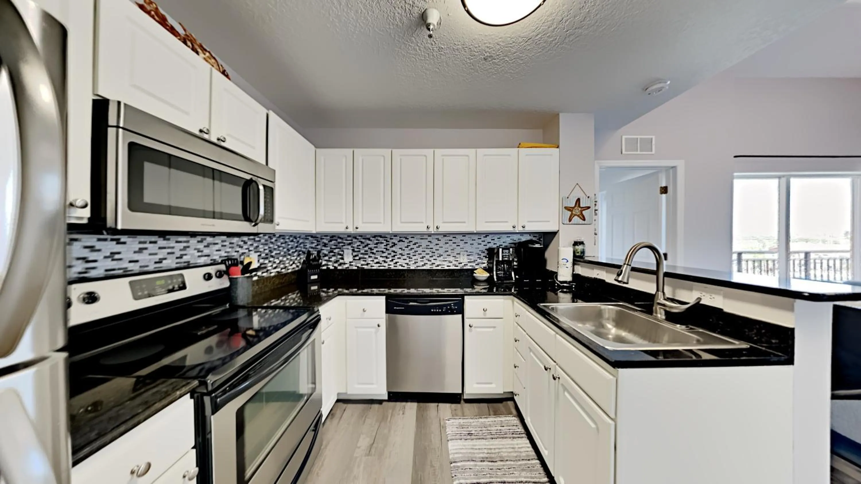 Kitchen or kitchenette in Madeira Bay Resort II by Travel Resort Services