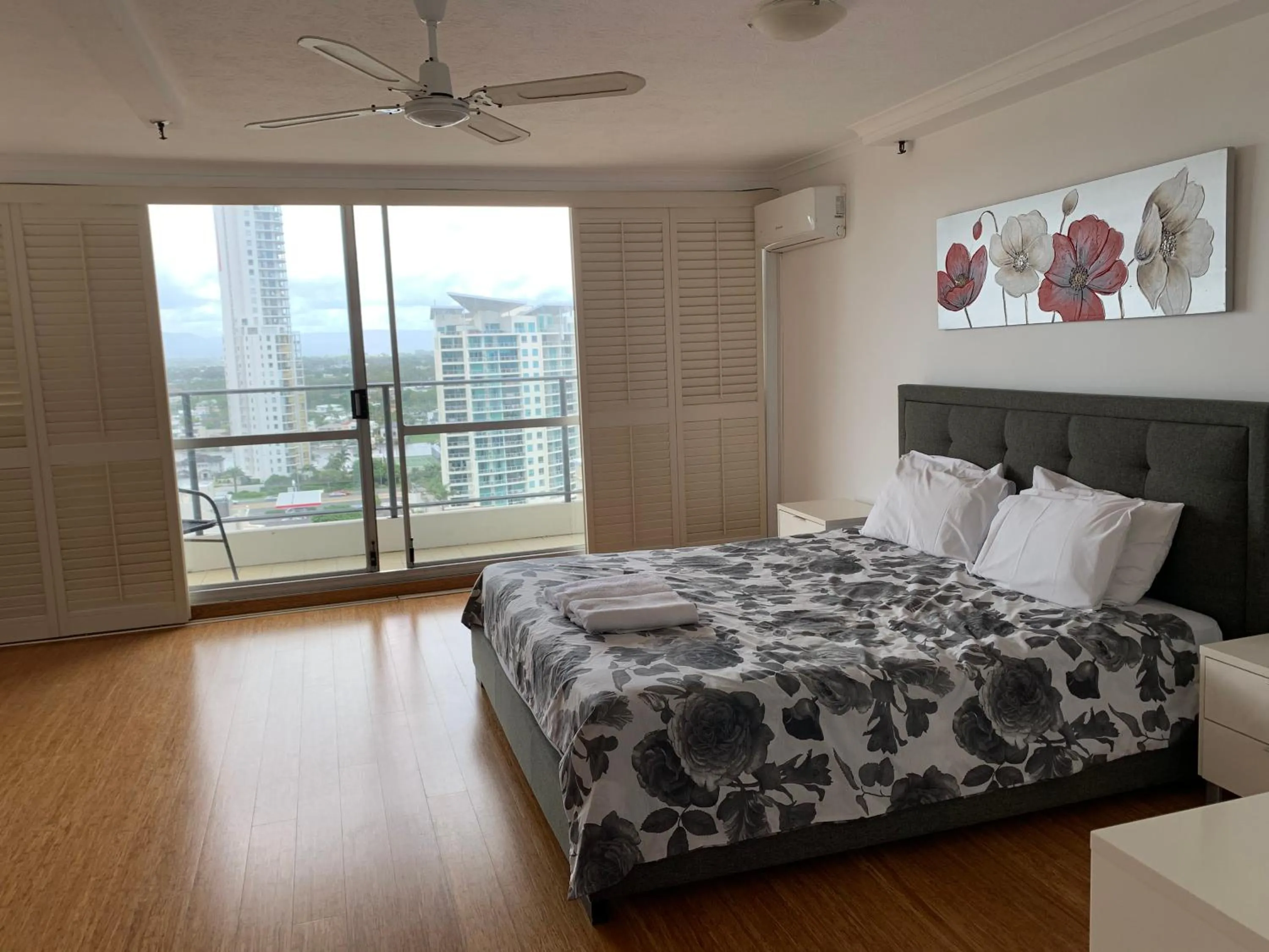 Bed in The Penthouses Apartments