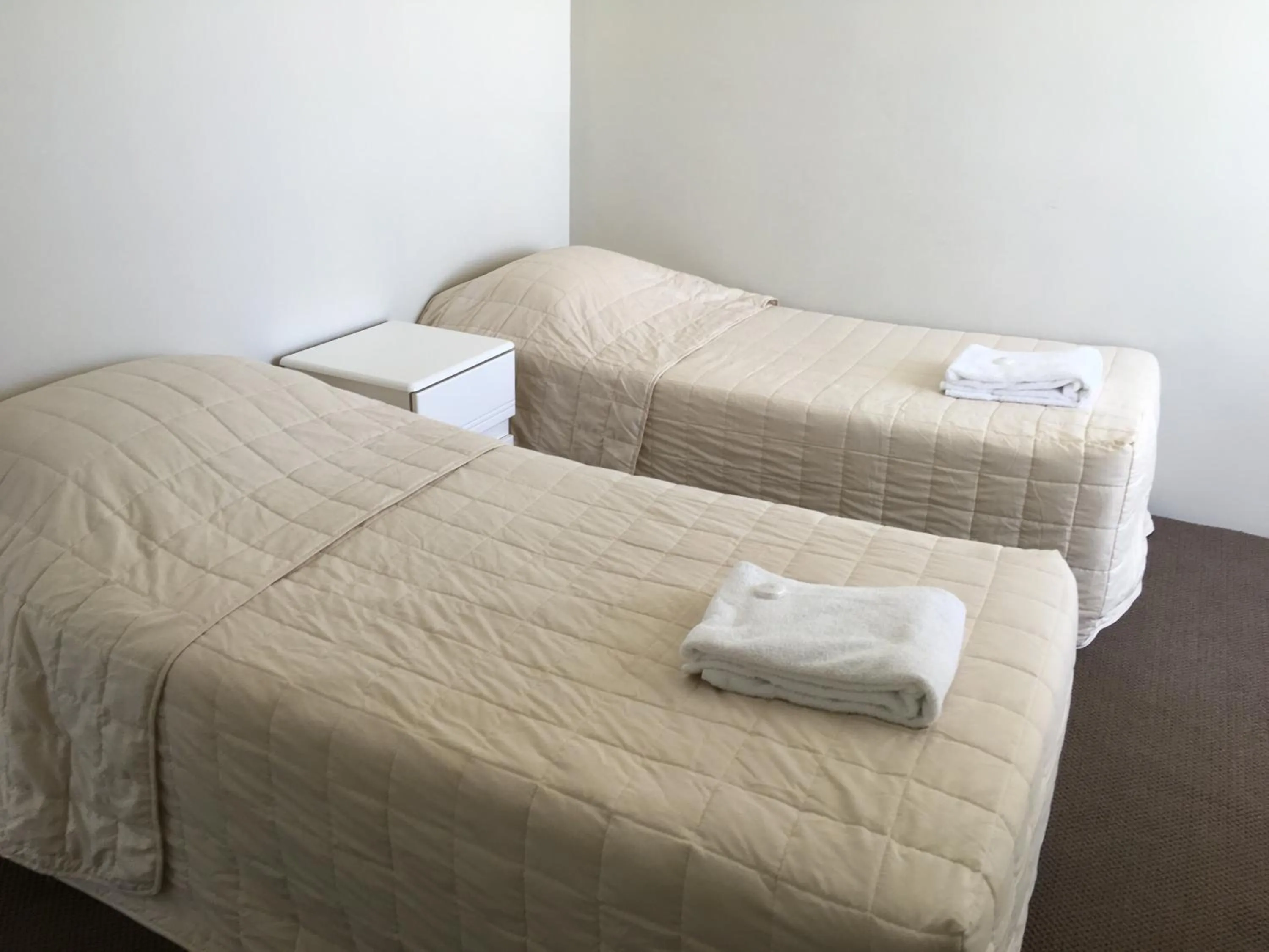 Bedroom, Bed in The Penthouses Apartments