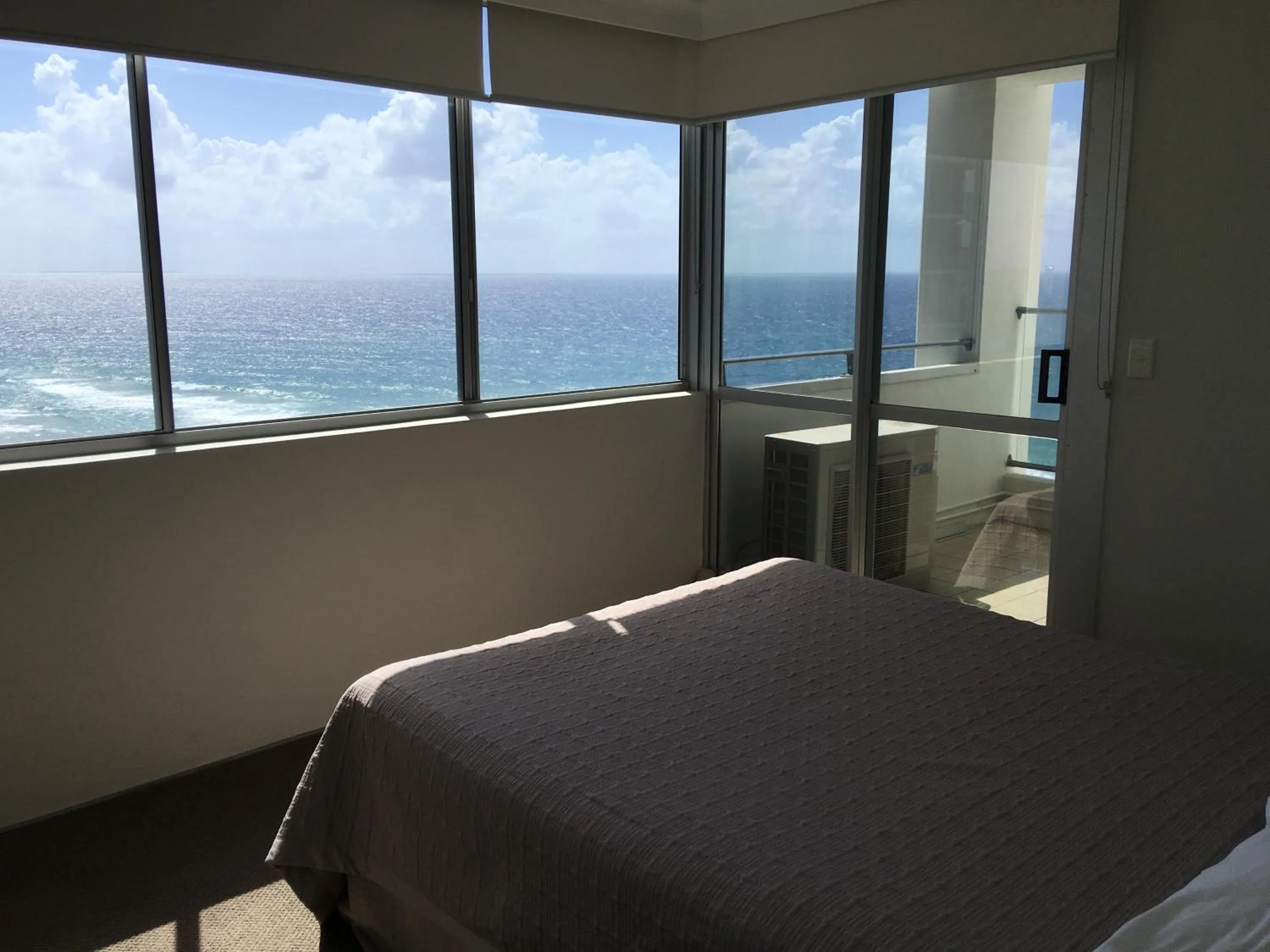 Bed in The Penthouses Apartments