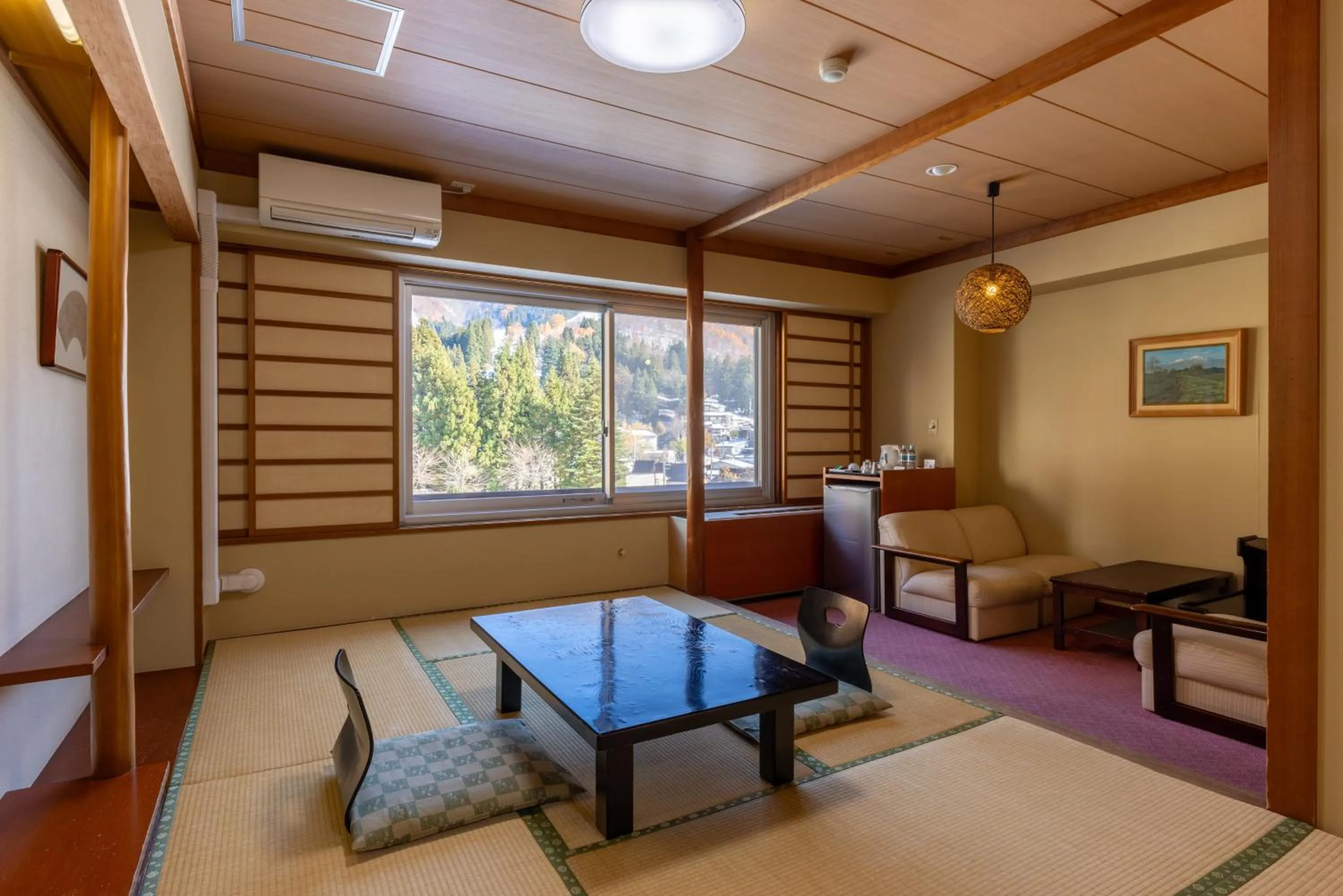 Seating area, Bed in Nozawa Grand Hotel