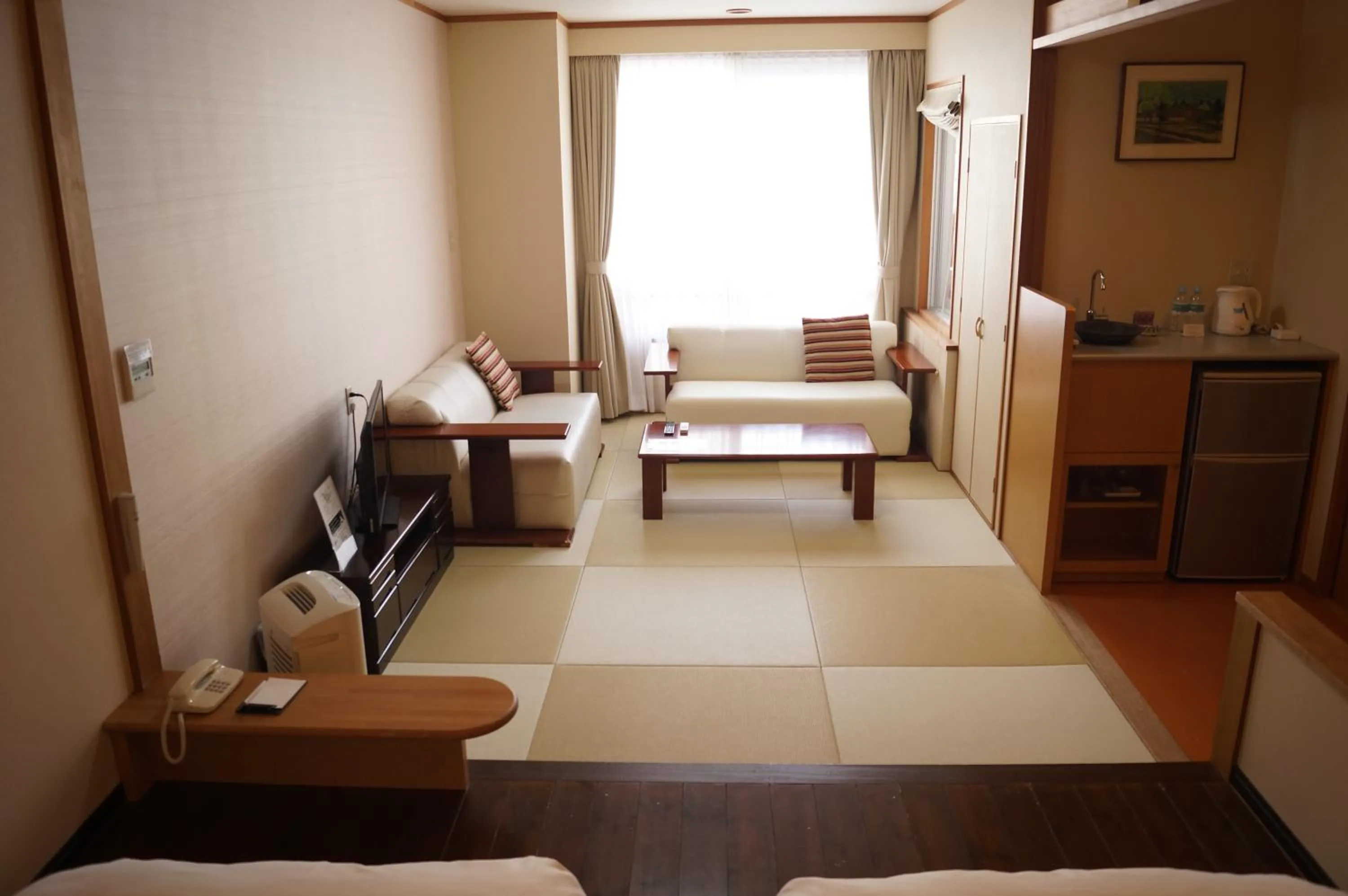 Seating area, Bed in Nozawa Grand Hotel