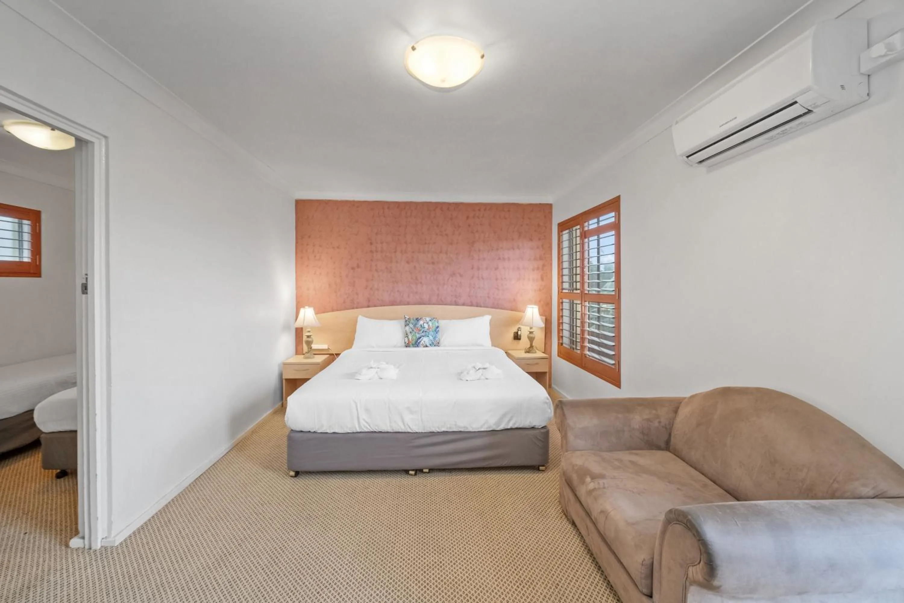 Bed in Country Plaza Motel Taree