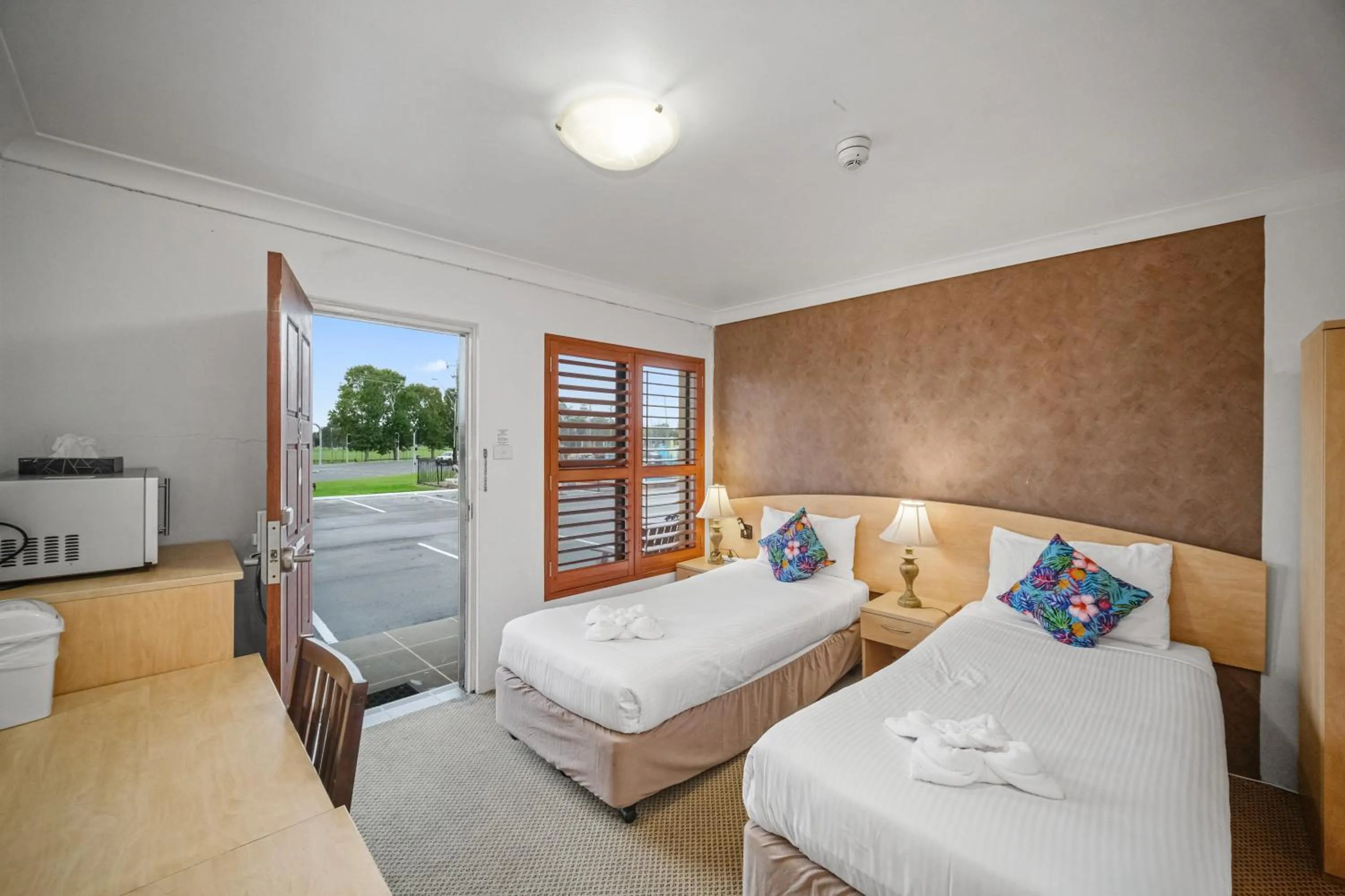 Bed in Country Plaza Motel Taree