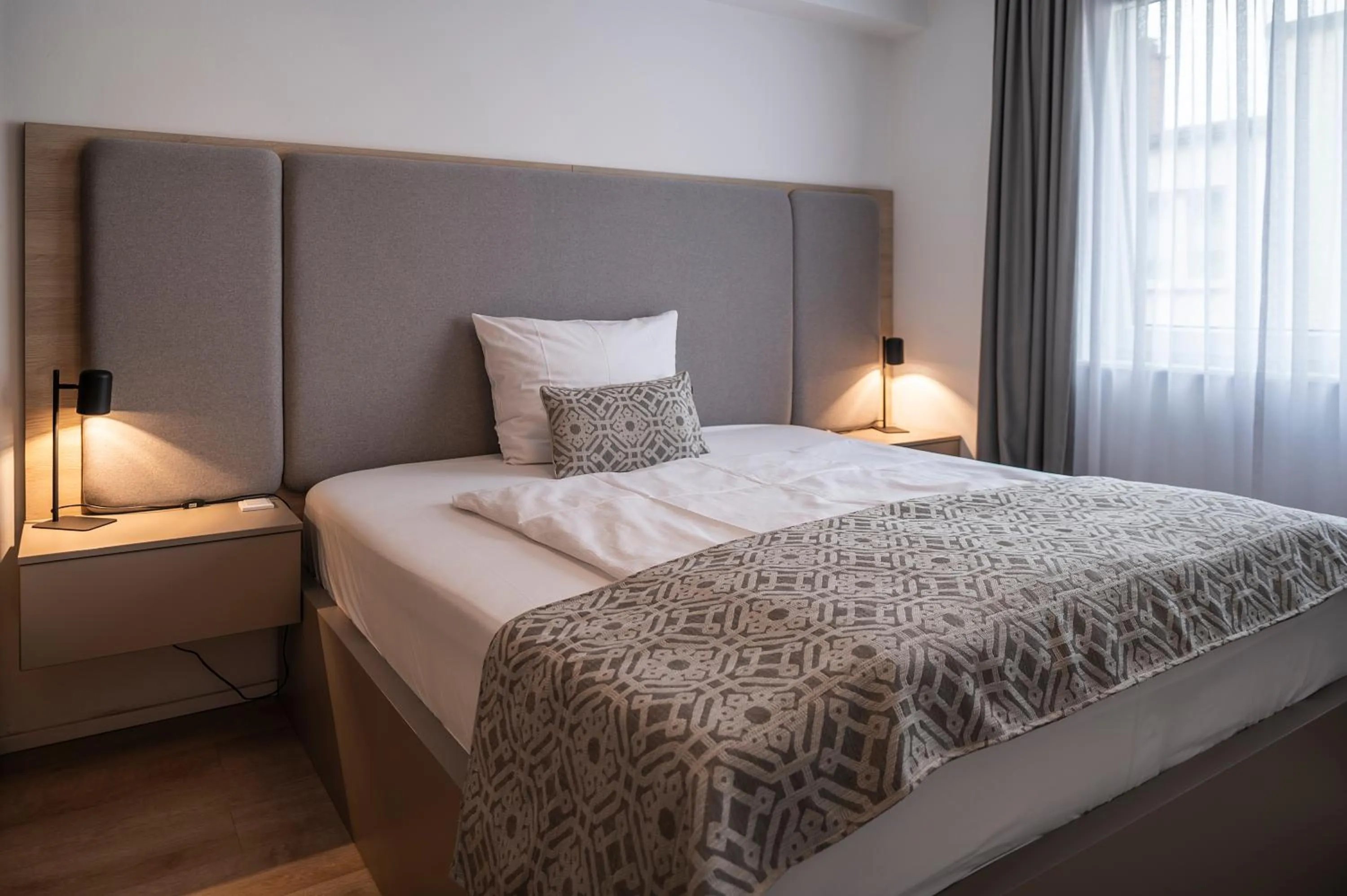 Bed in Aparthotel Cosy