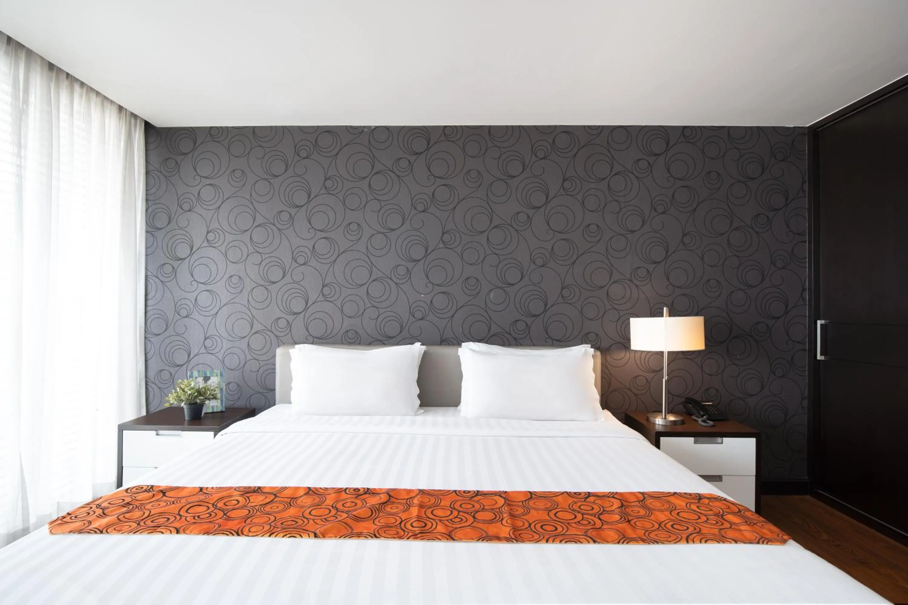 Bed in Lily Hotel Bangkok