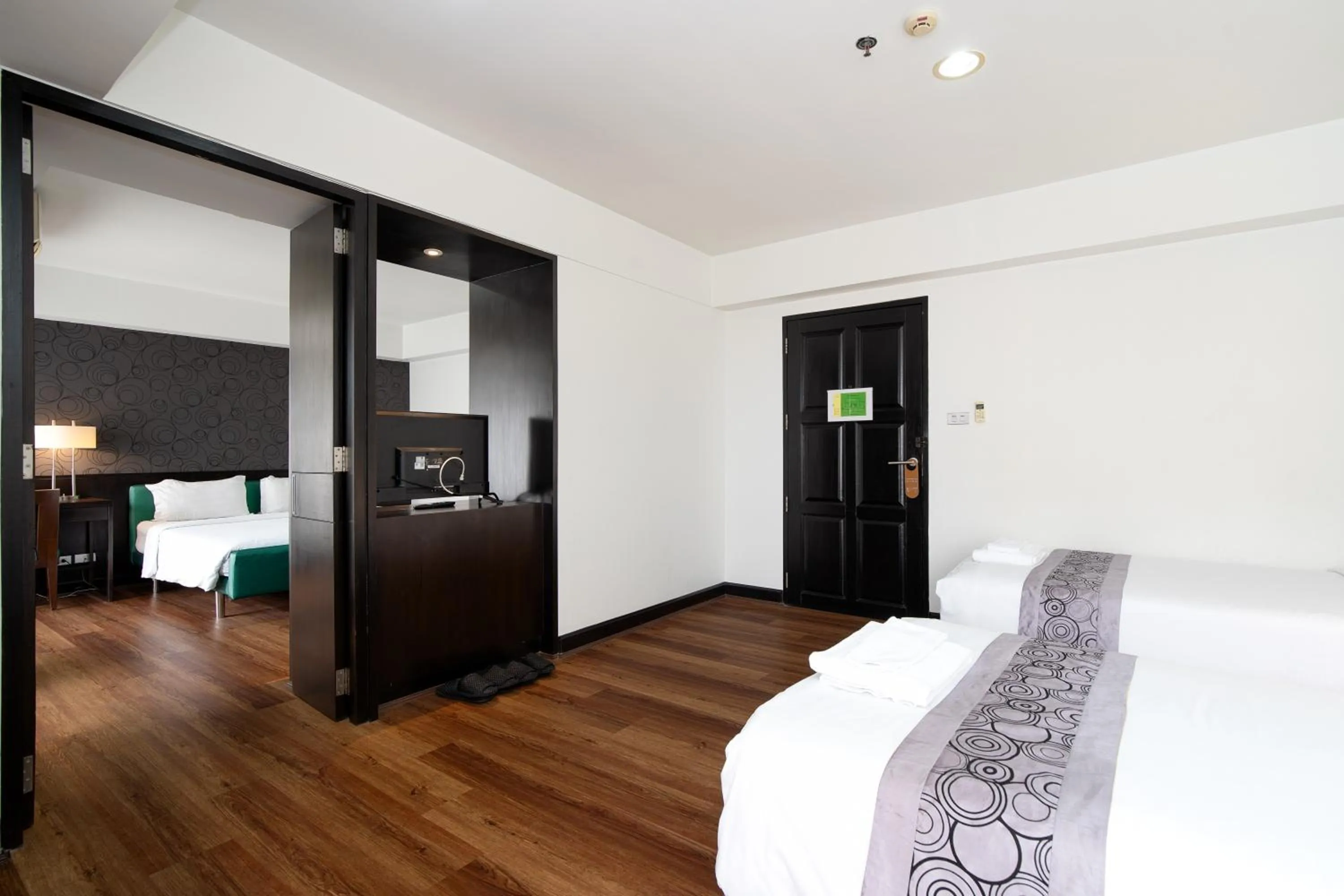 Bed in Lily Hotel Bangkok