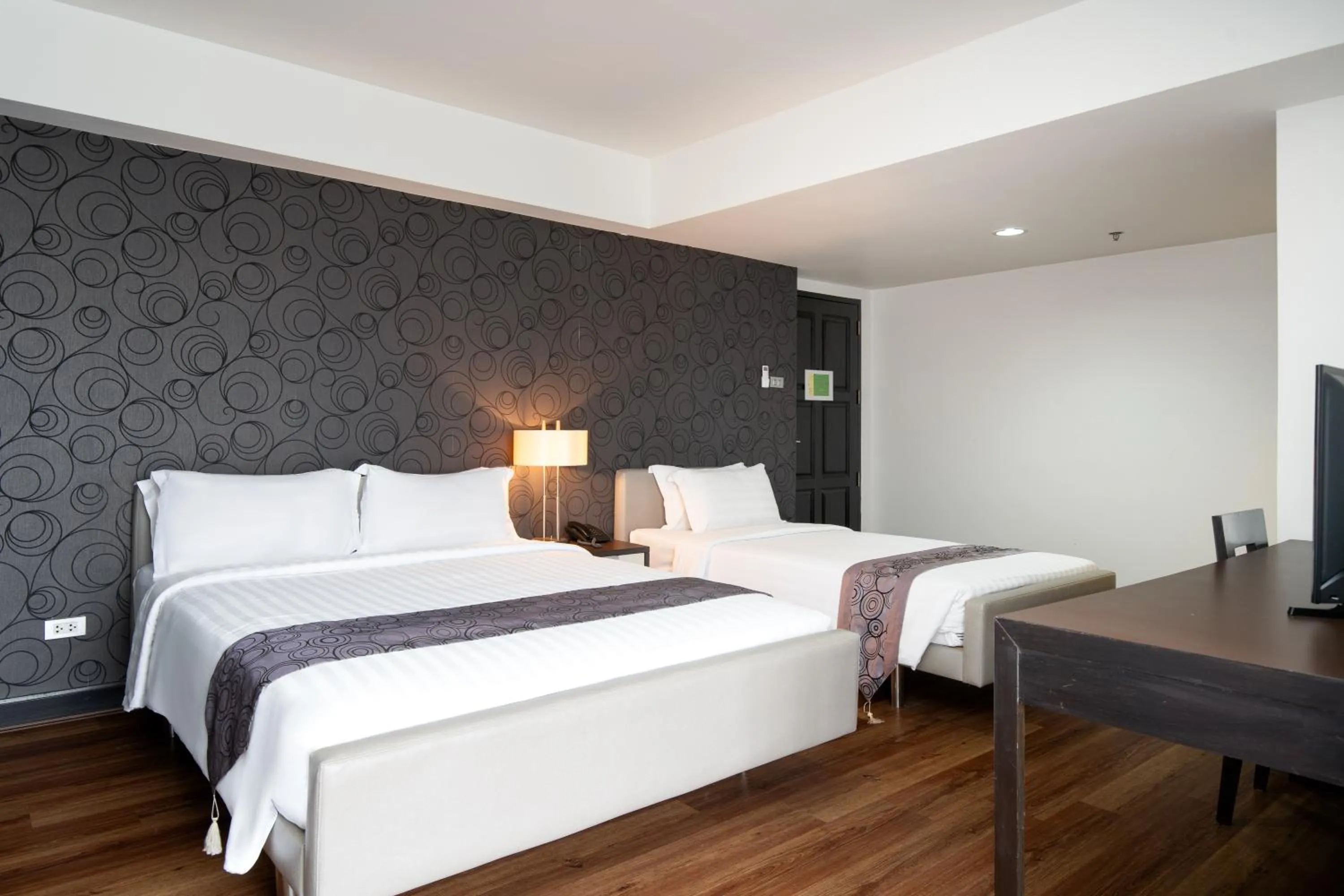 Bed in Lily Hotel Bangkok