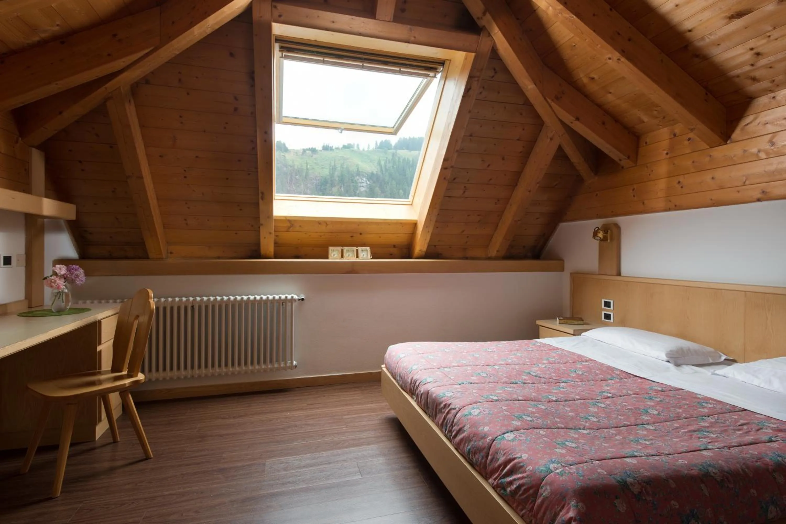 Bed in Apartments Boè