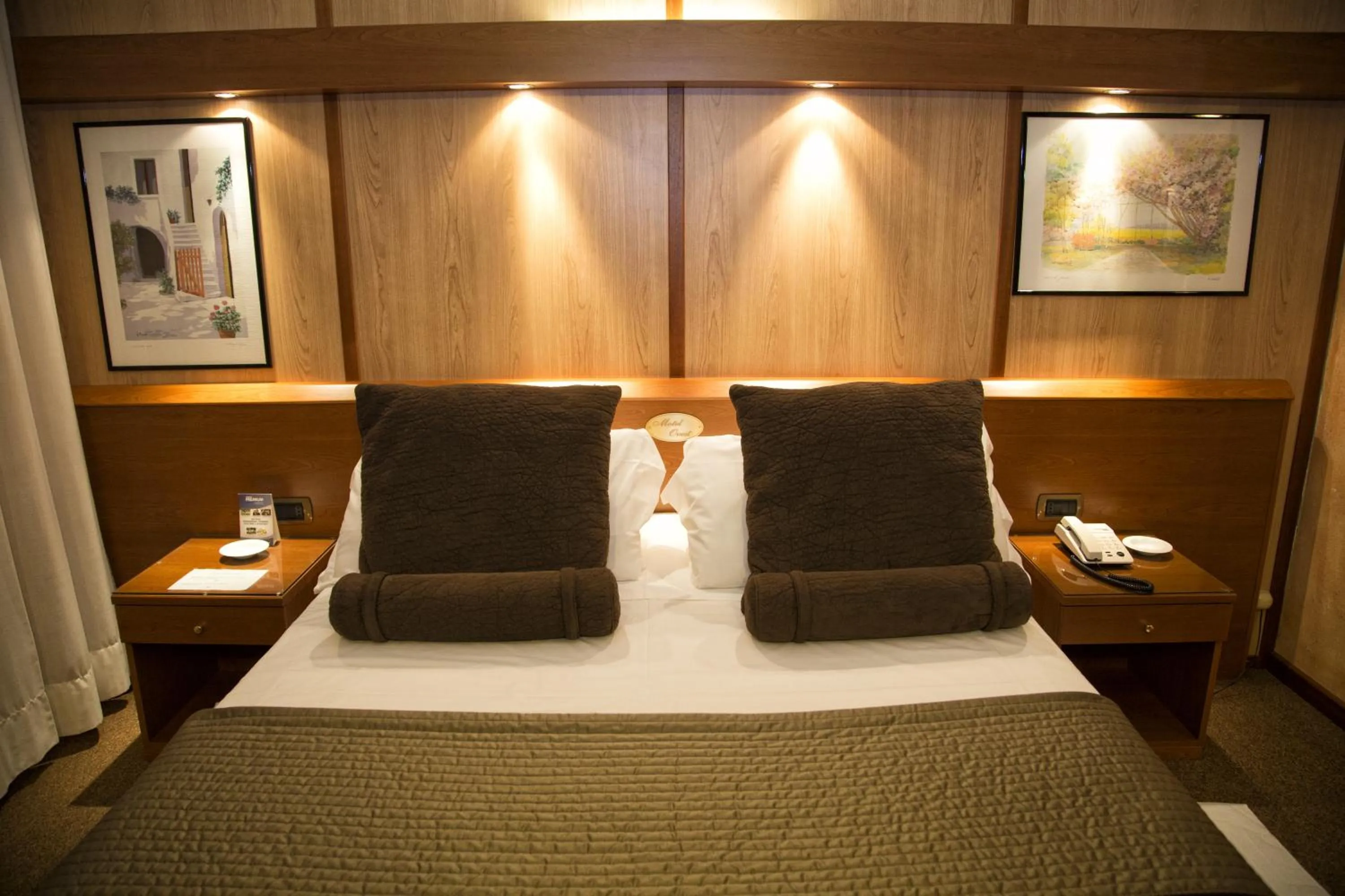 Decorative detail, Bed in Hotel Motel Ovest