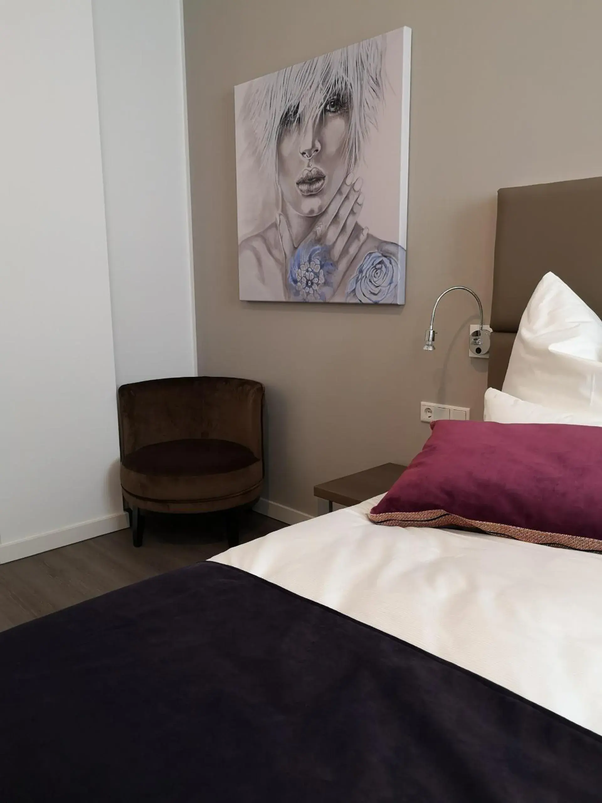 Seating area, Bed in Trip Inn PostApart Aschaffenburg Seating area, Bed in Trip Inn PostApart Aschaffenburg