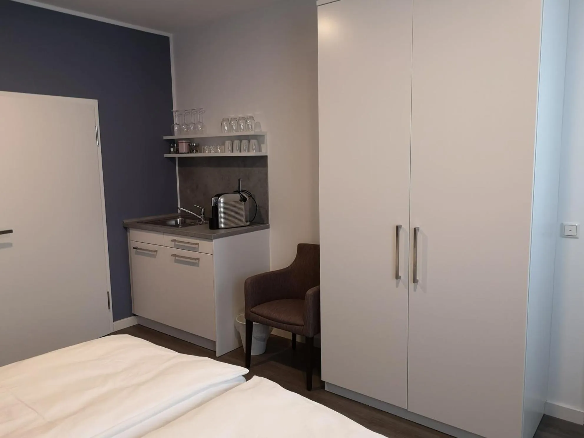 Kitchen or kitchenette, Bed in Trip Inn PostApart Aschaffenburg