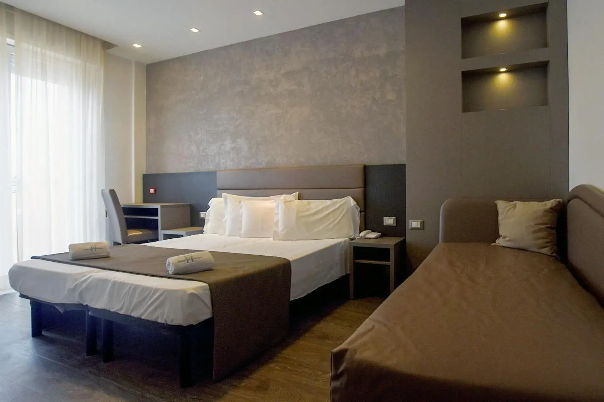 Bed in Hotel Aurora