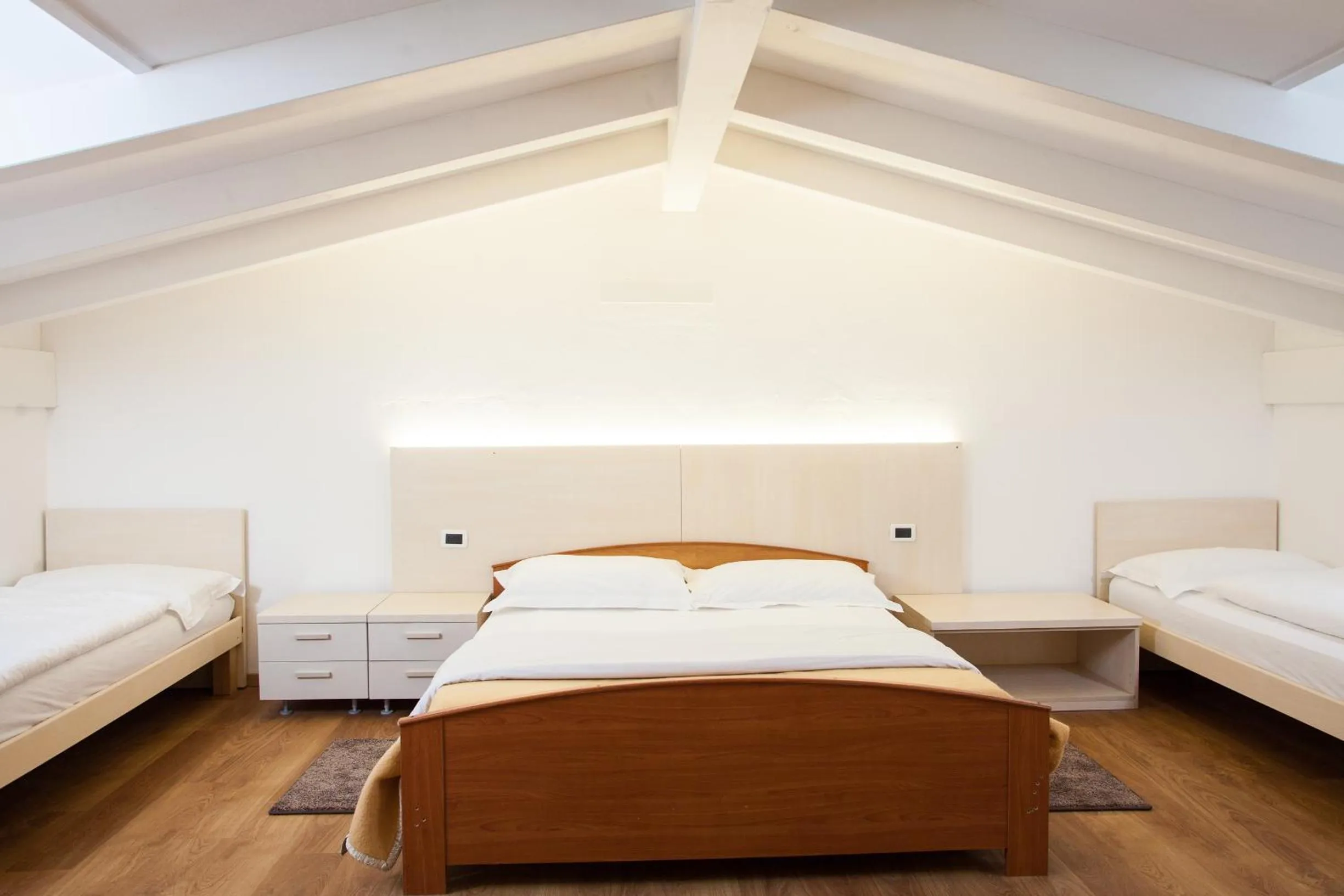 Photo of the whole room, Bed in Hotel Comfort Erica Dolomiti Val d'Adige