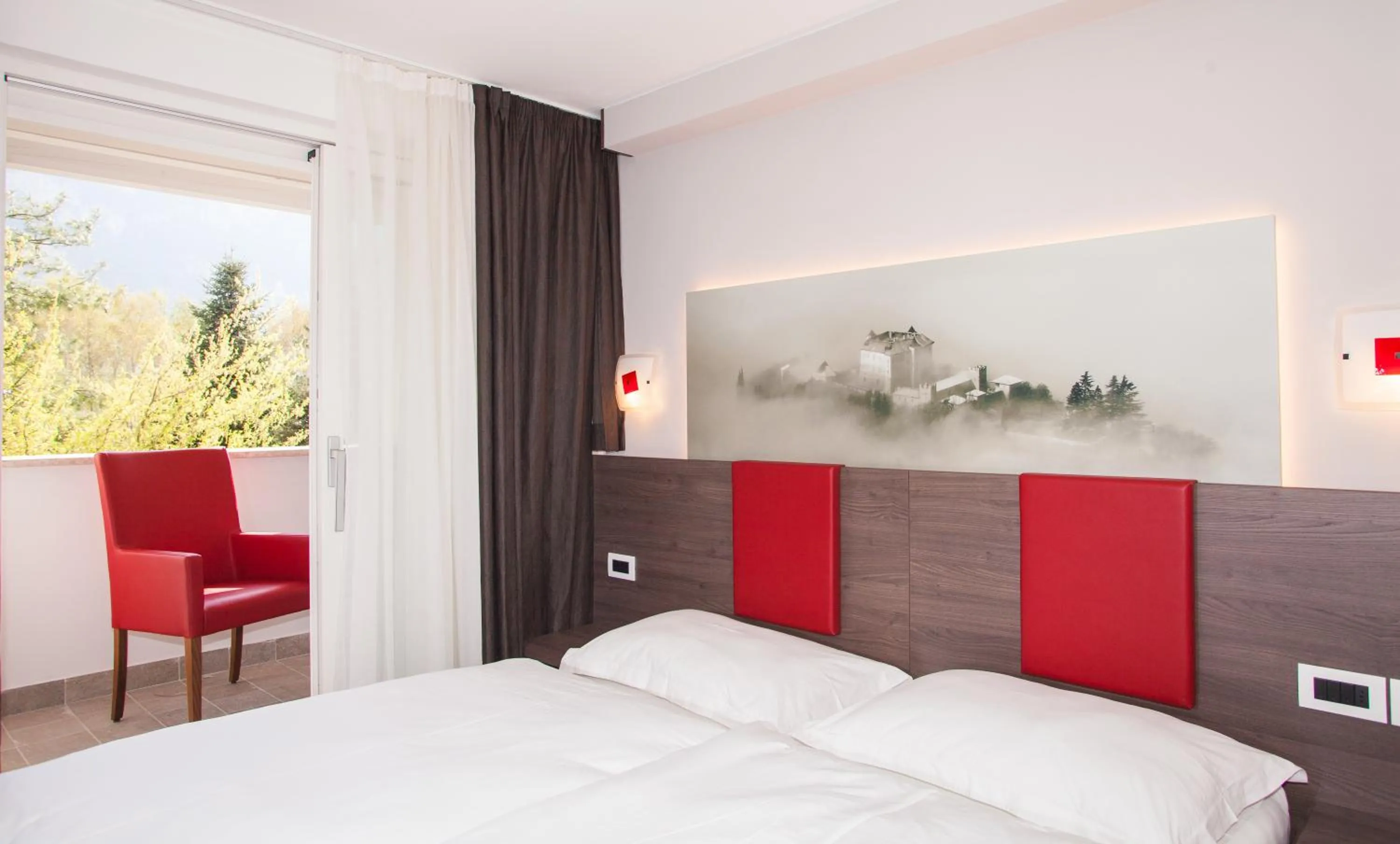 Photo of the whole room, Bed in Hotel Comfort Erica Dolomiti Val d'Adige