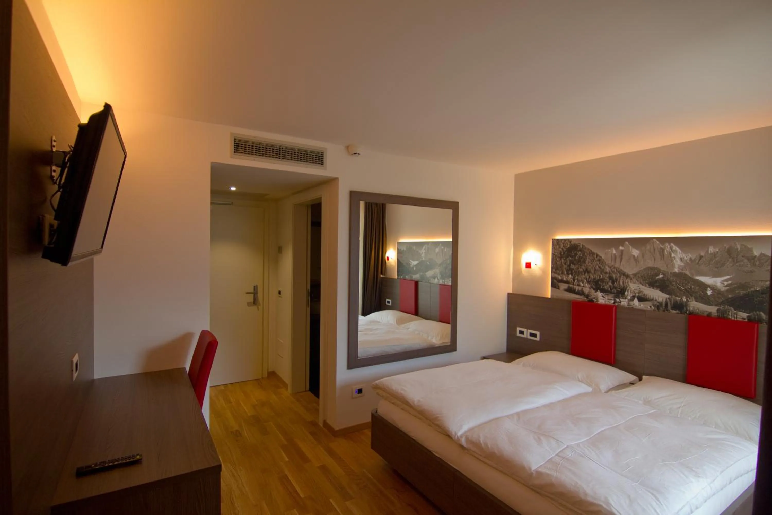 Bedroom, Bed in Hotel Comfort Erica Dolomiti Val d'Adige