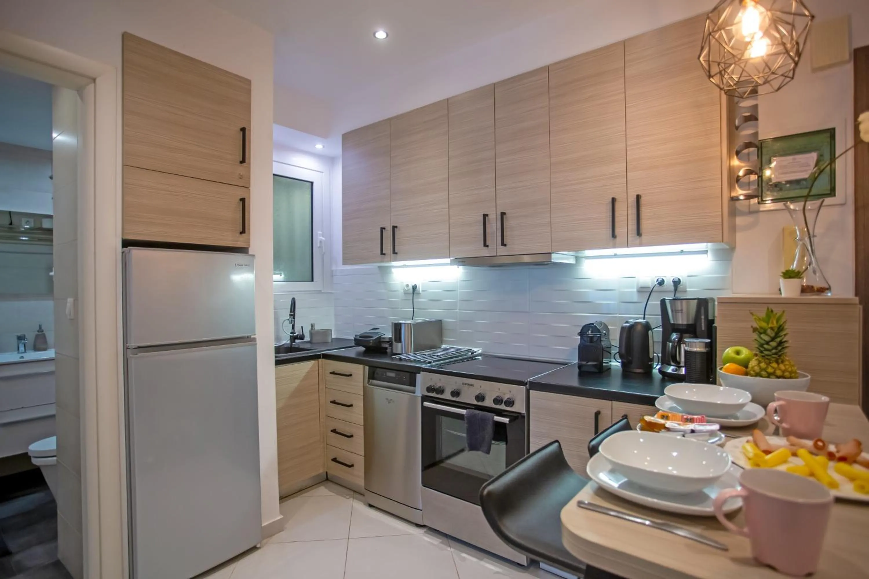 kitchen in Hadrian by Heloni Apartments