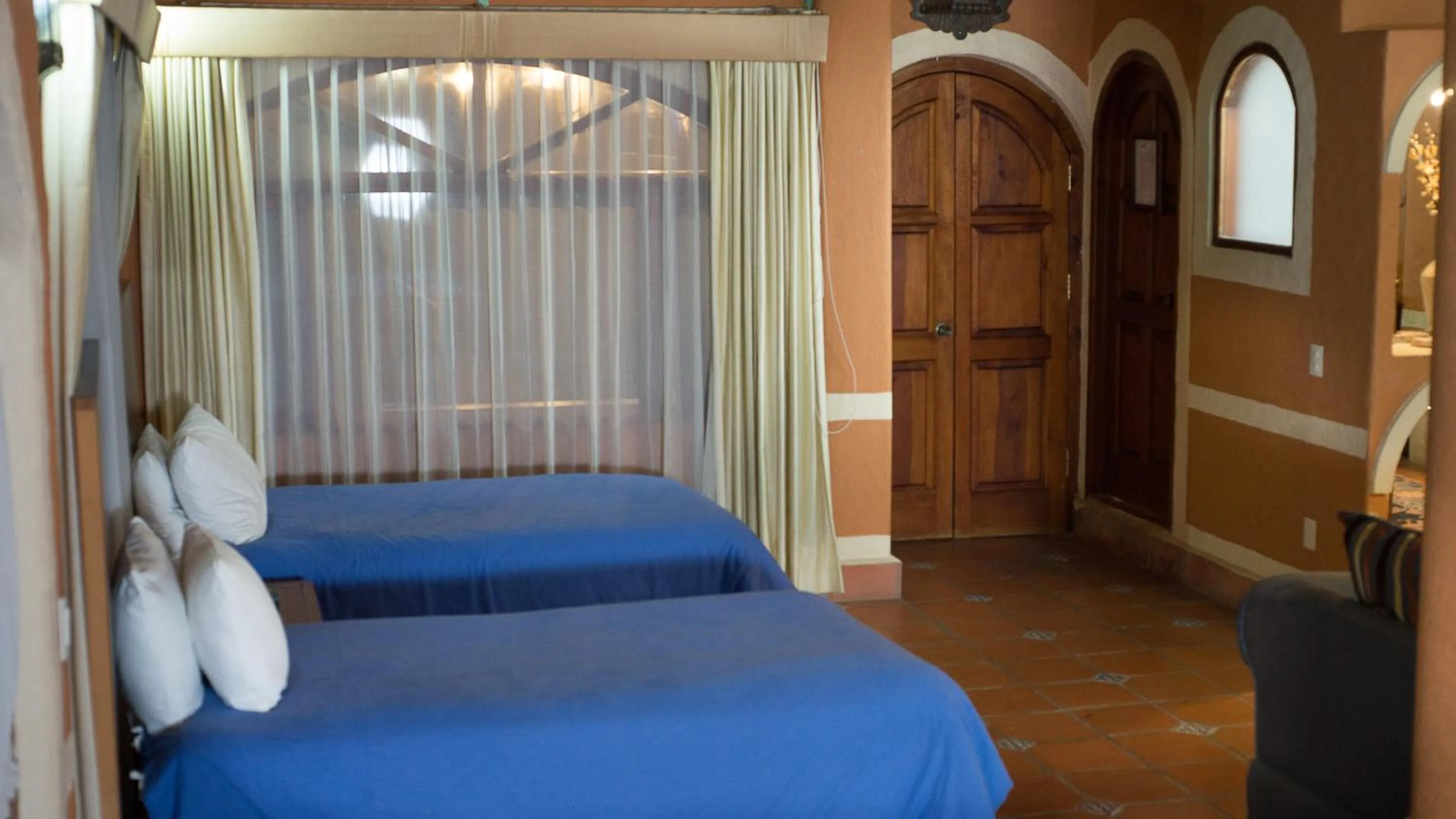 Bed in Hotel El Rebozo