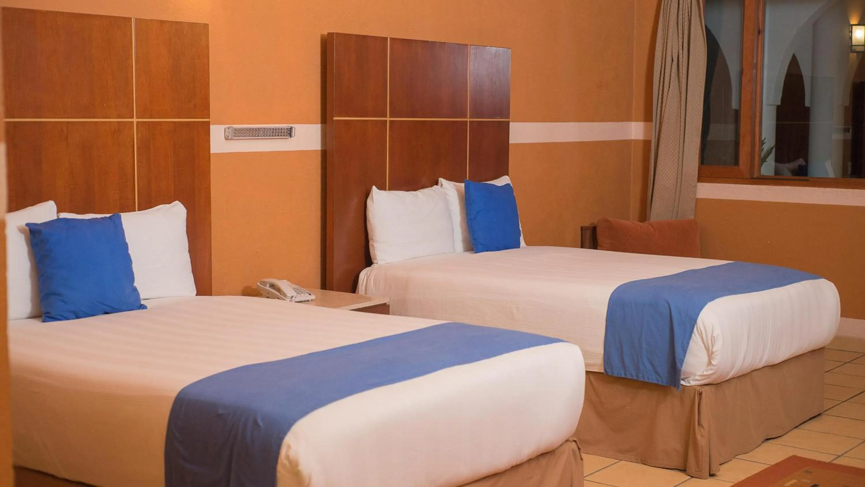 Bed in Hotel El Rebozo