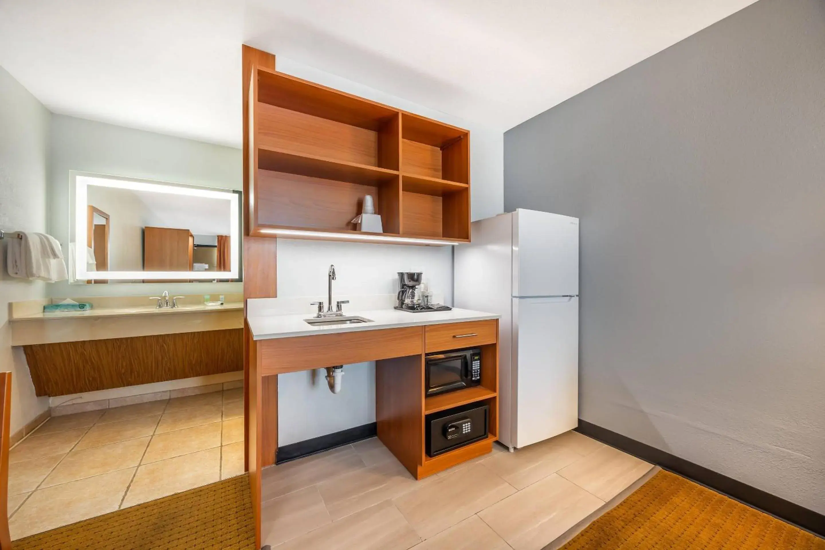 Bedroom in Suburban Studios Branson On The Strip Bedroom in Suburban Studios Branson On The Strip