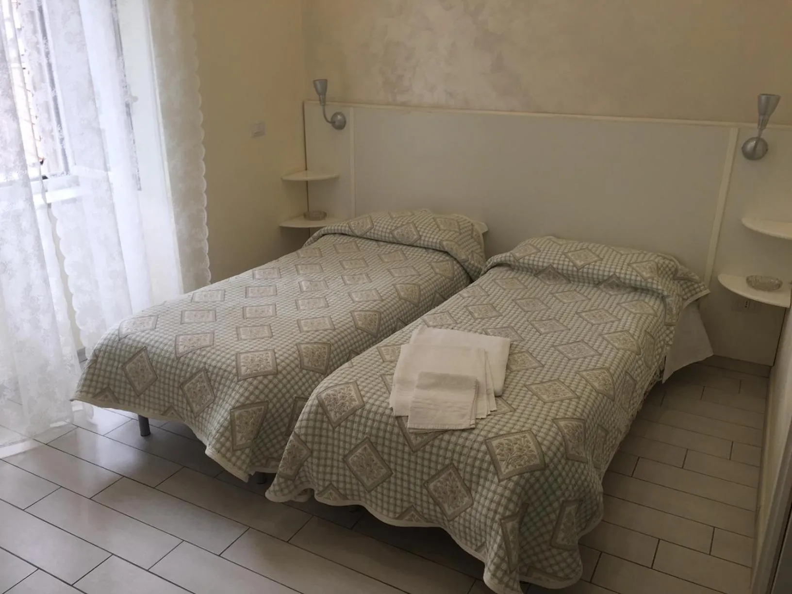 Bed in Albergo Oasi