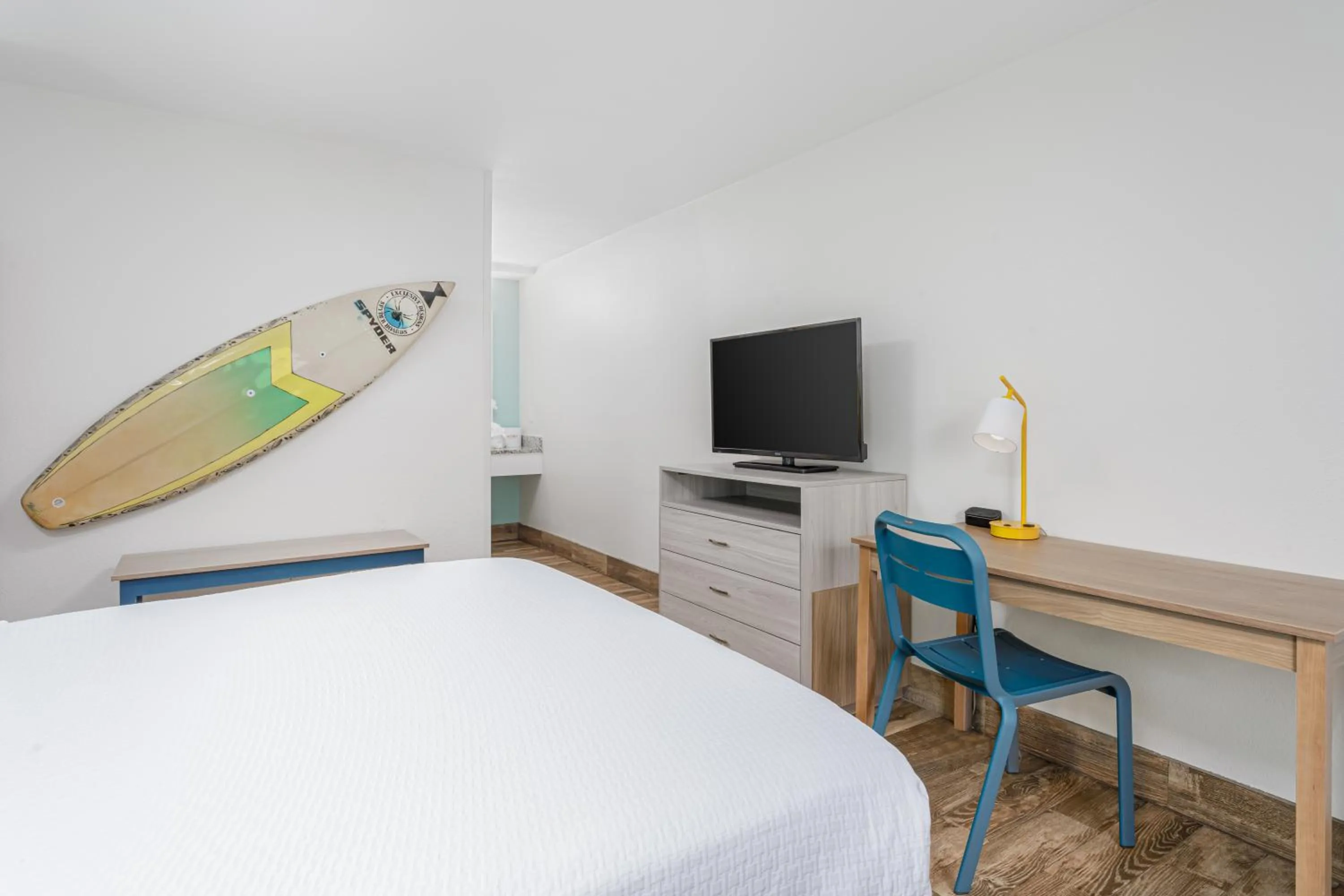 Bed in Surf & Sand Hotel