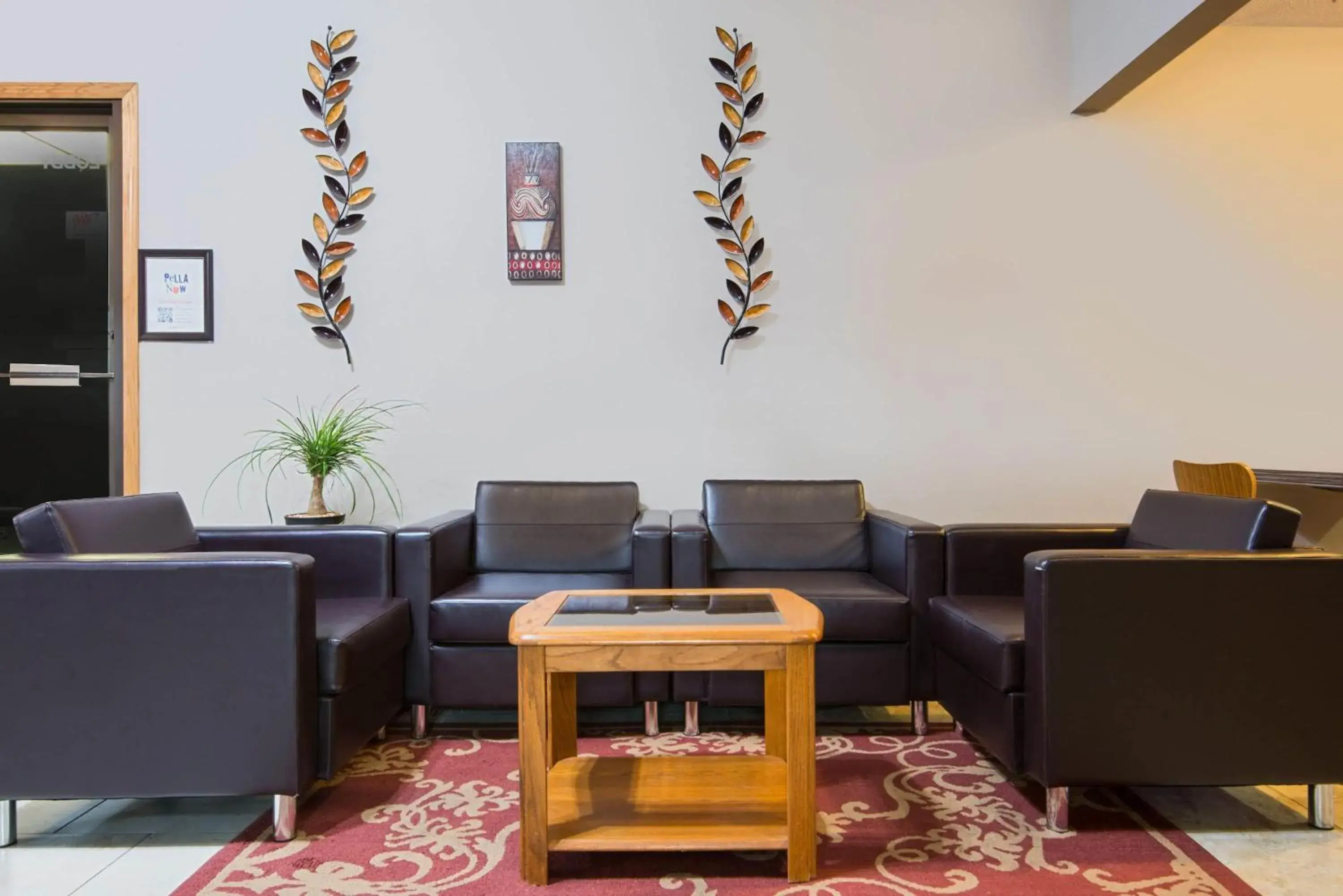 Lobby or reception in Super 8 by Wyndham Pella Lobby or reception in Super 8 by Wyndham Pella