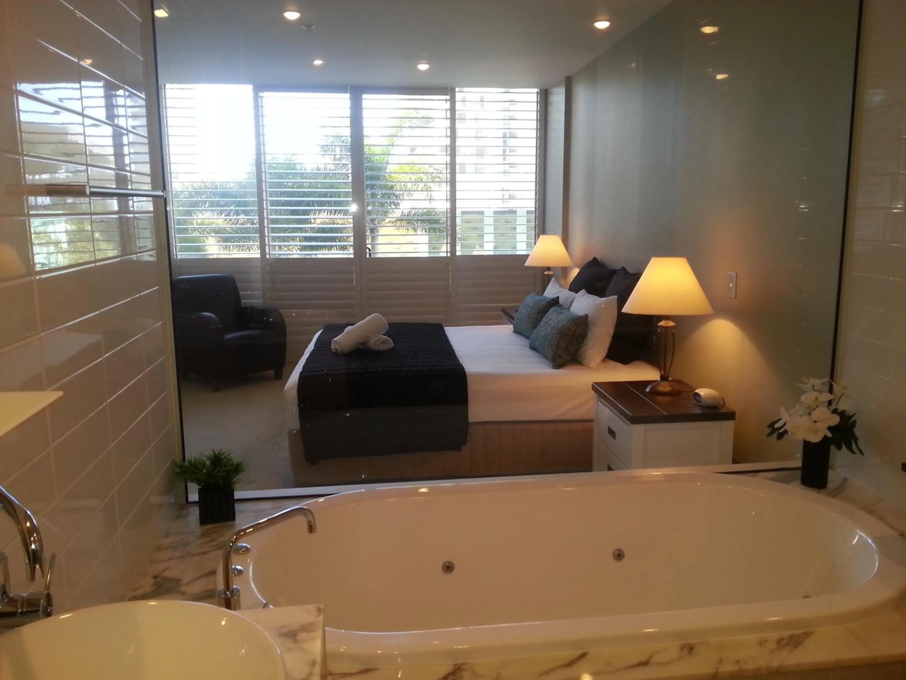 Bathroom, Bed in Aria Apartments