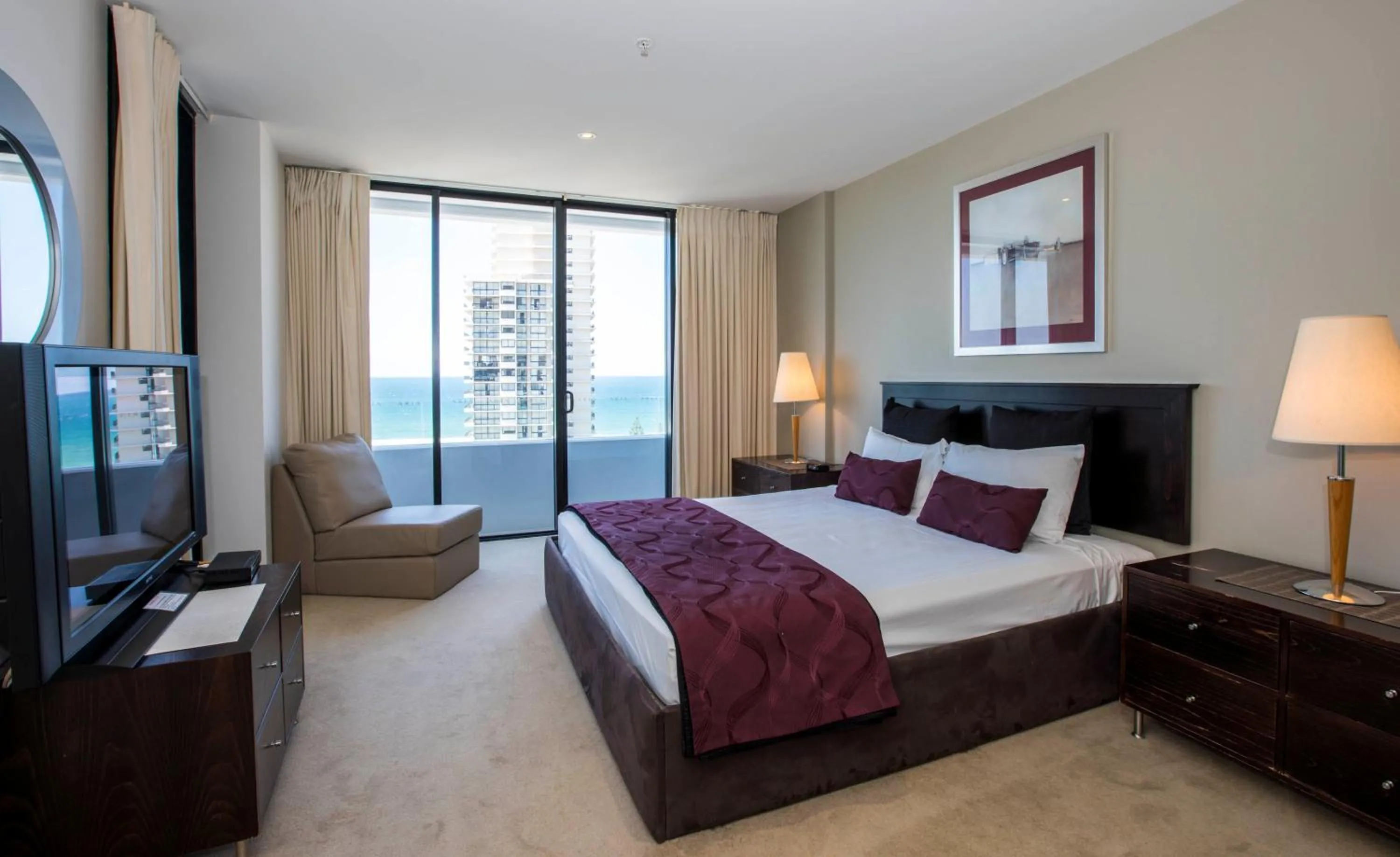 Bed in Aria Apartments