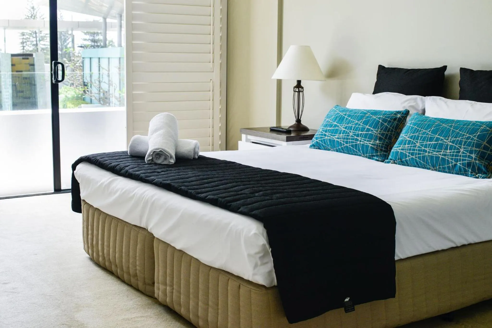 Bed in Aria Apartments