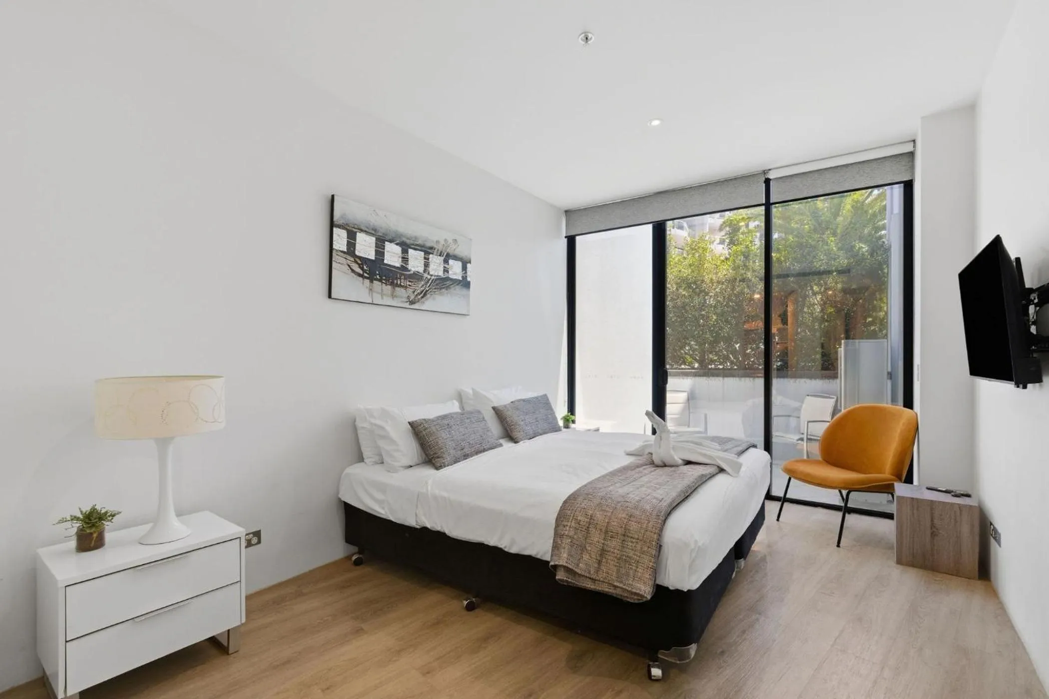 Bed in Aria Apartments