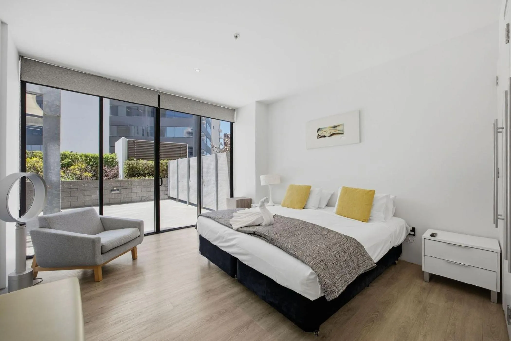 Bed in Aria Apartments